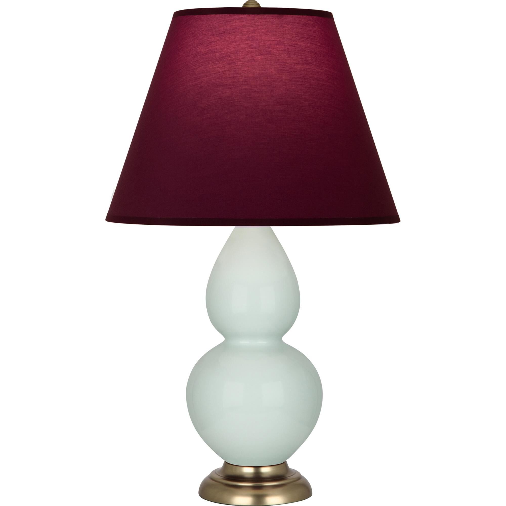 Shown in Celadon finish and Plum and Lavender shade and Antique Natural Brass accent