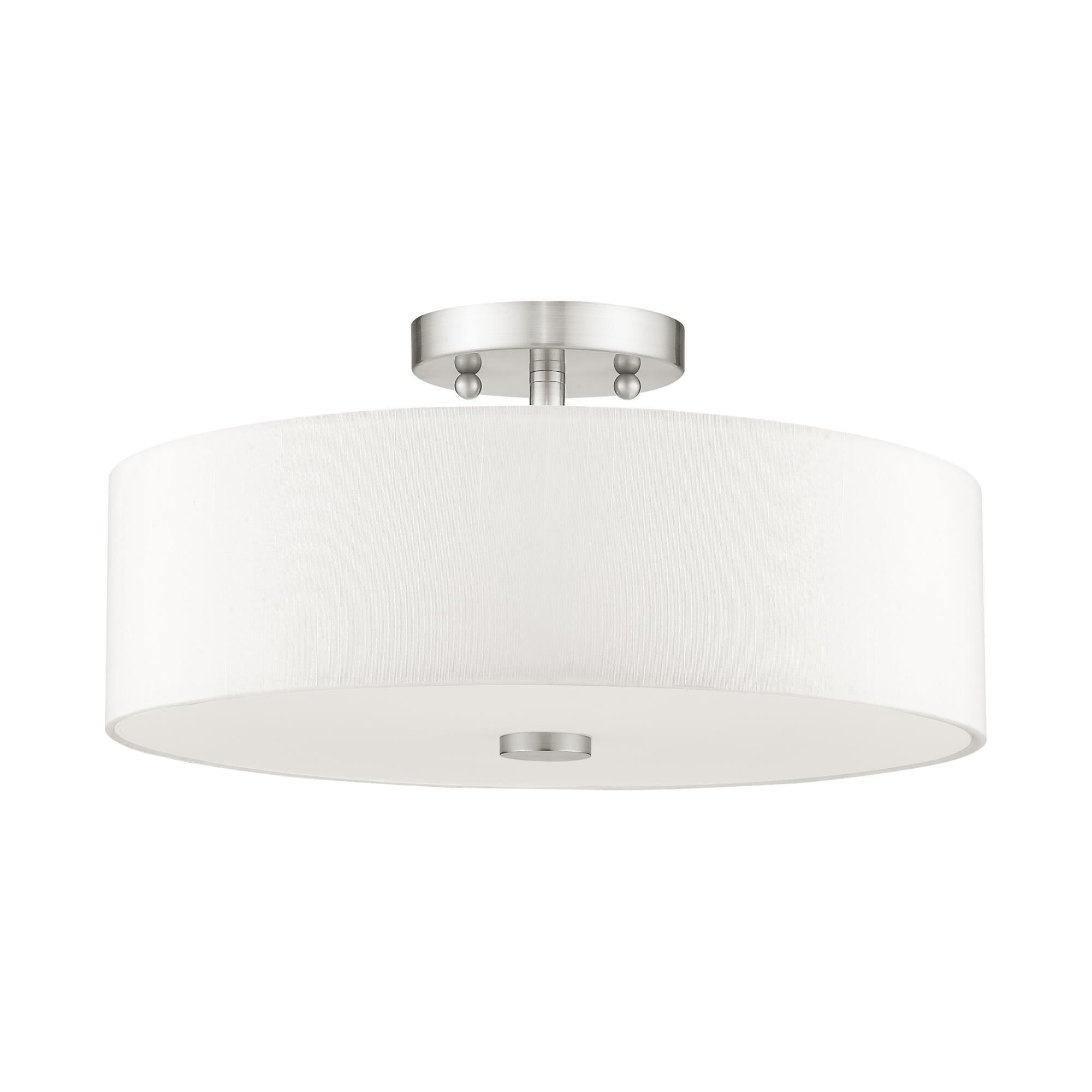 Shown in Brushed Nickel finish and Hand Crafted Off-White Fabric Hardback shade