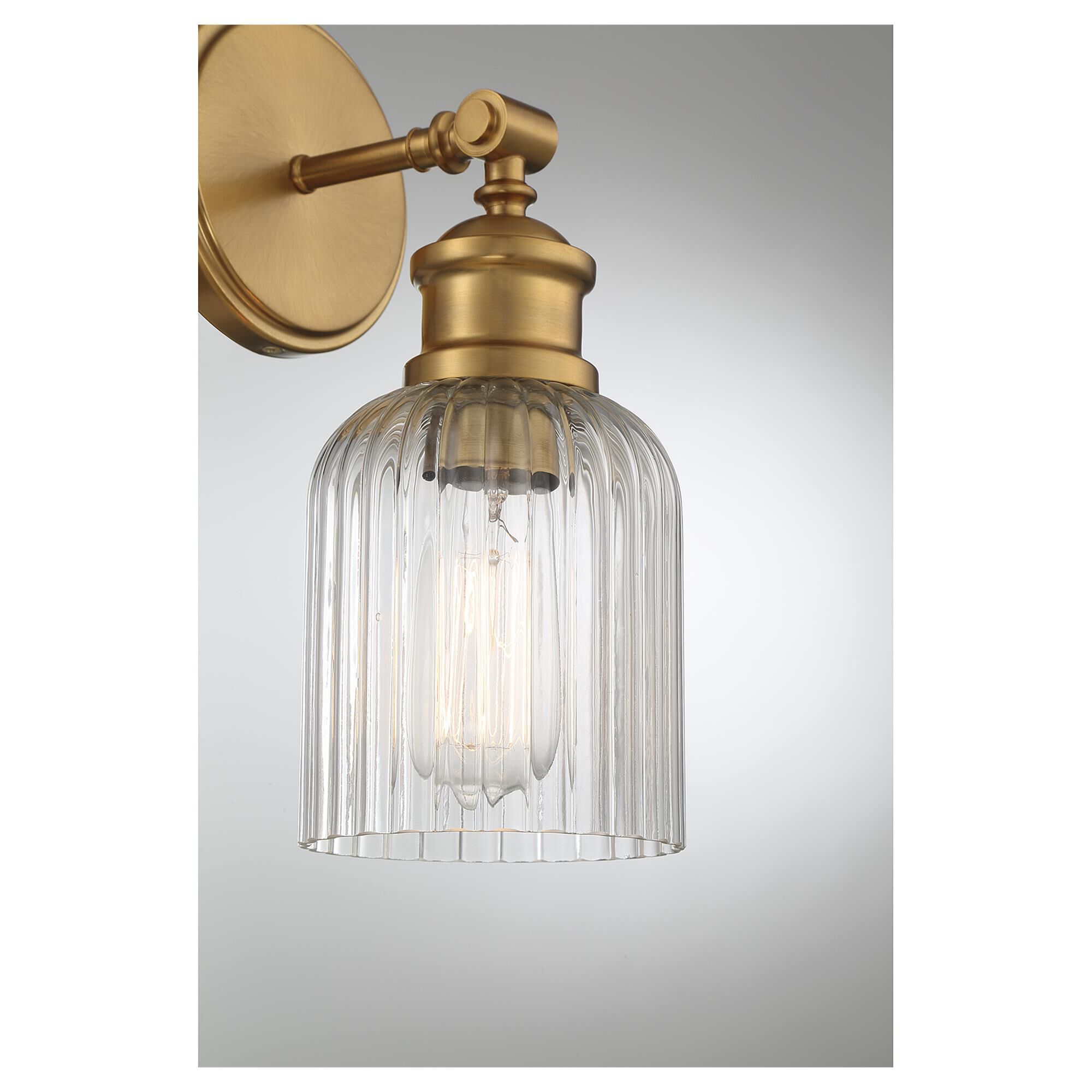 Shown in Natural Brass finish and Ribbed glass