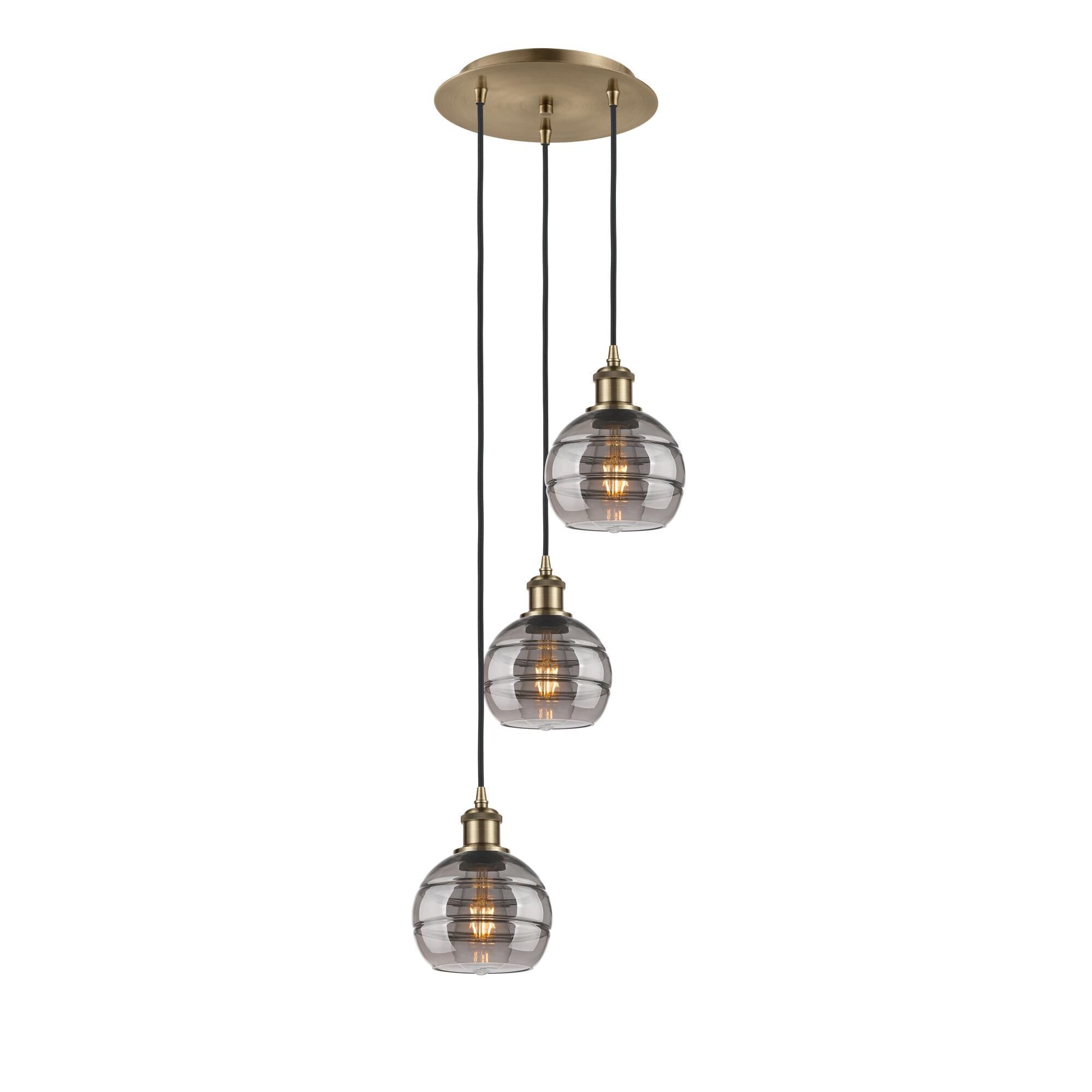 Shown in Antique Brass finish and Light Smoke glass