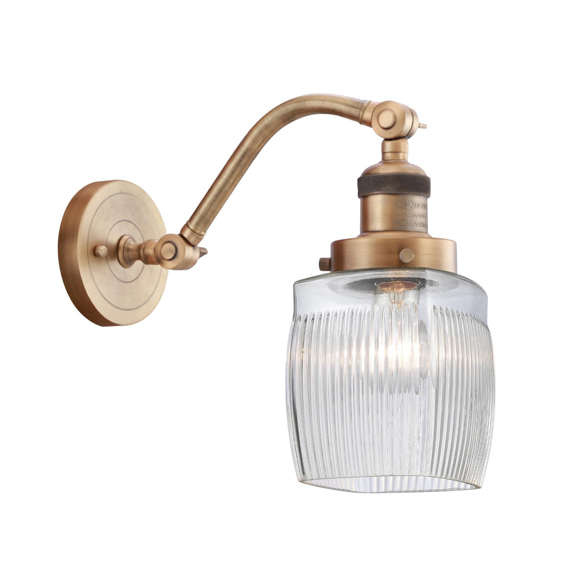 Shown in Brushed Brass finish and Thick Clear Halophane Colton glass