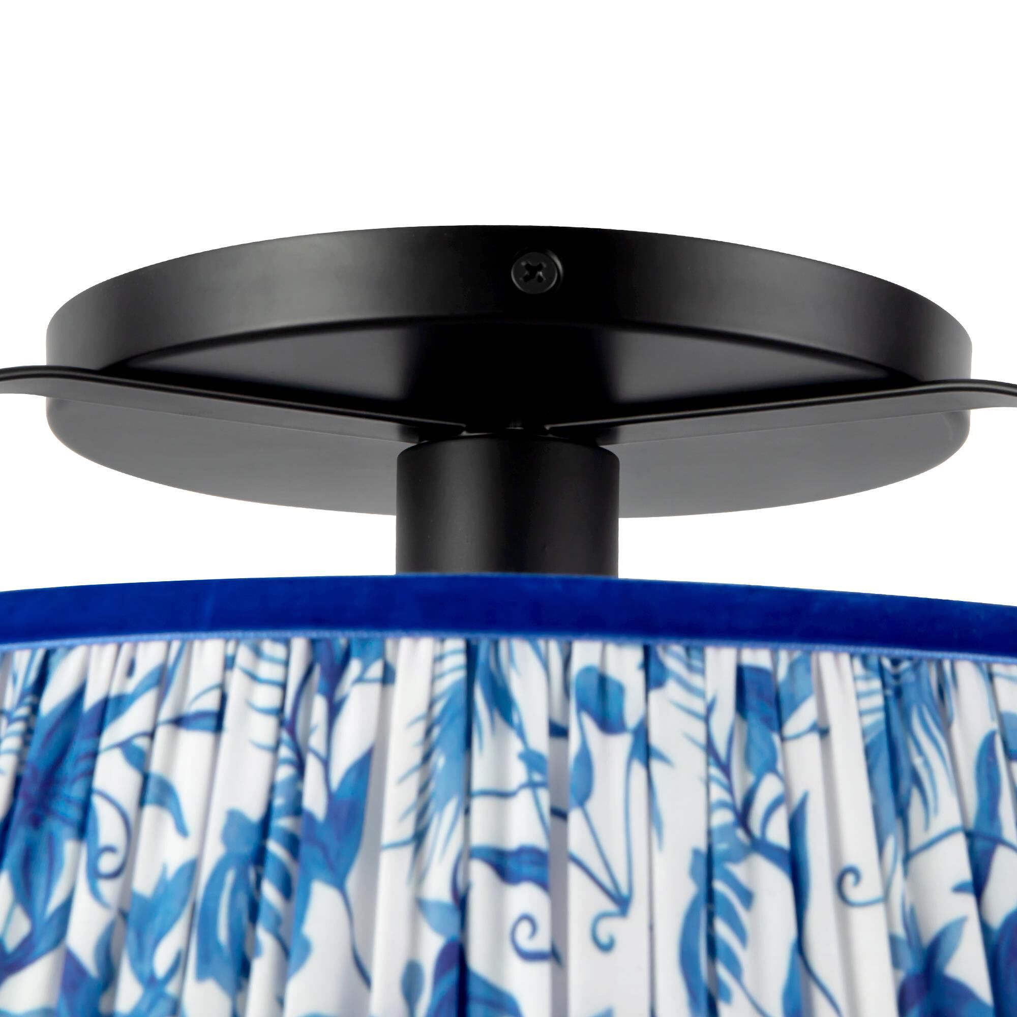 Shown in Matte Black finish and Frosted Polycarbonate Diffuser glass and Blue Linen shade