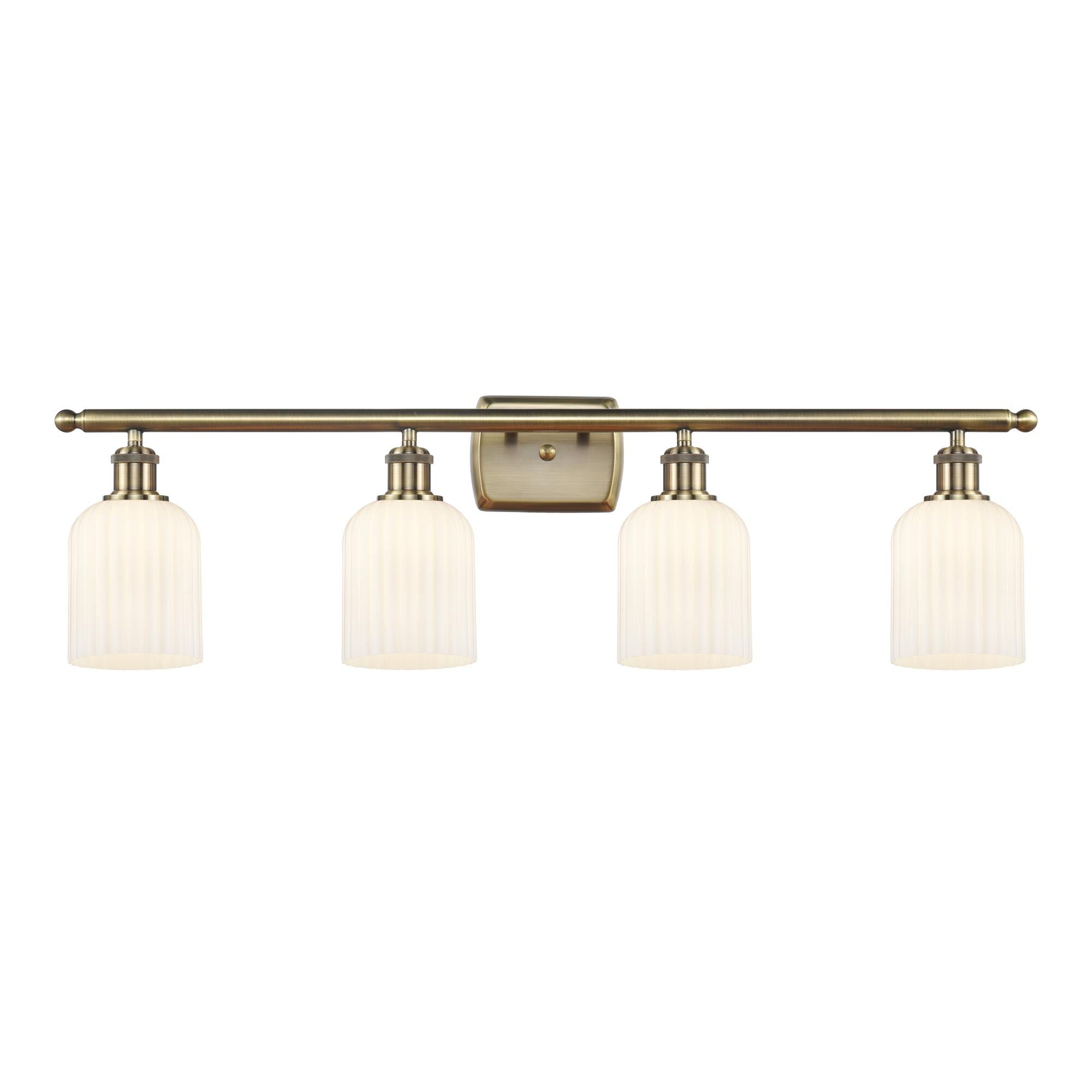 Shown in Antique Brass finish and Gloss White shade