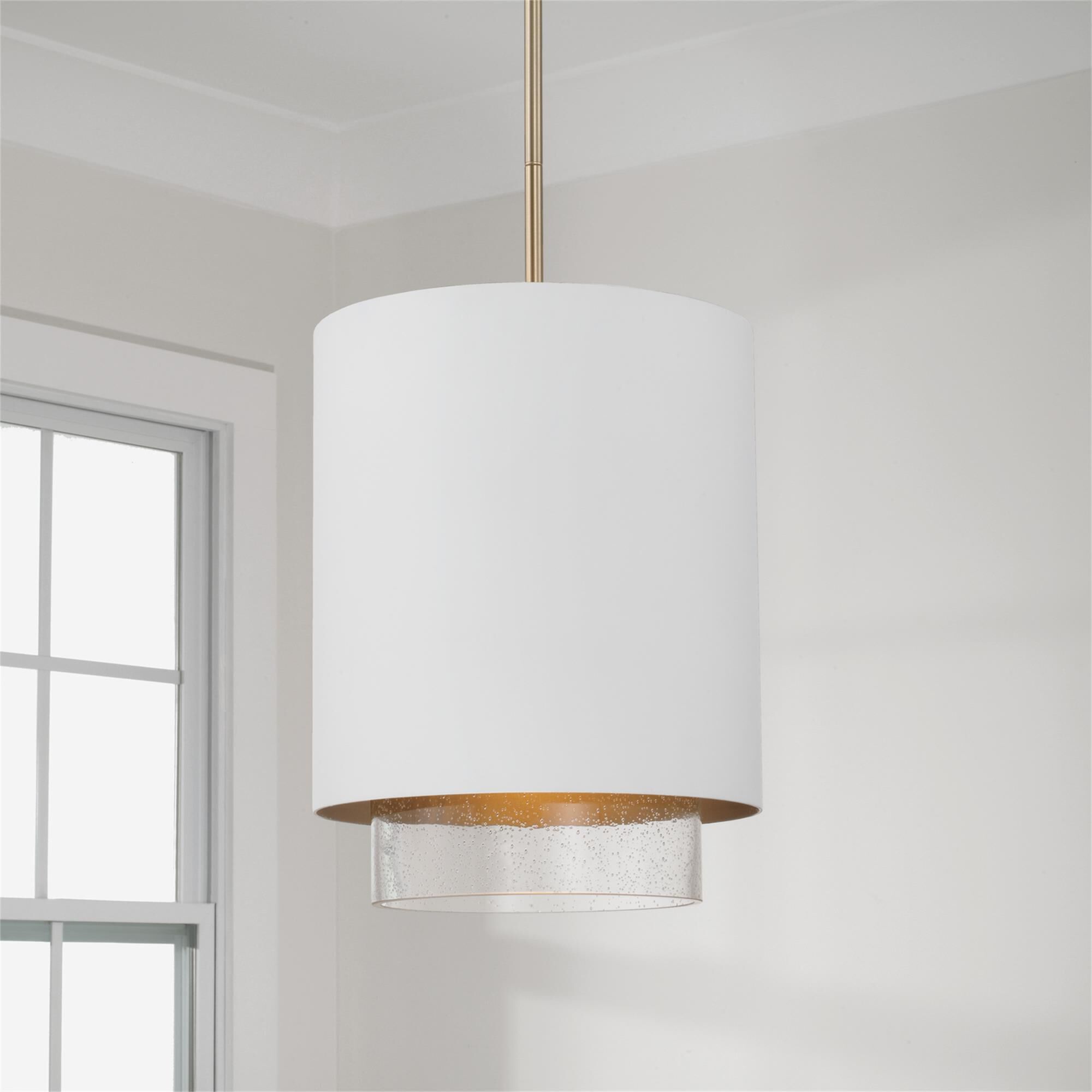 Shown in Matte Brass and White finish and Clear Seeded glass and Metal with Brass Interior shade