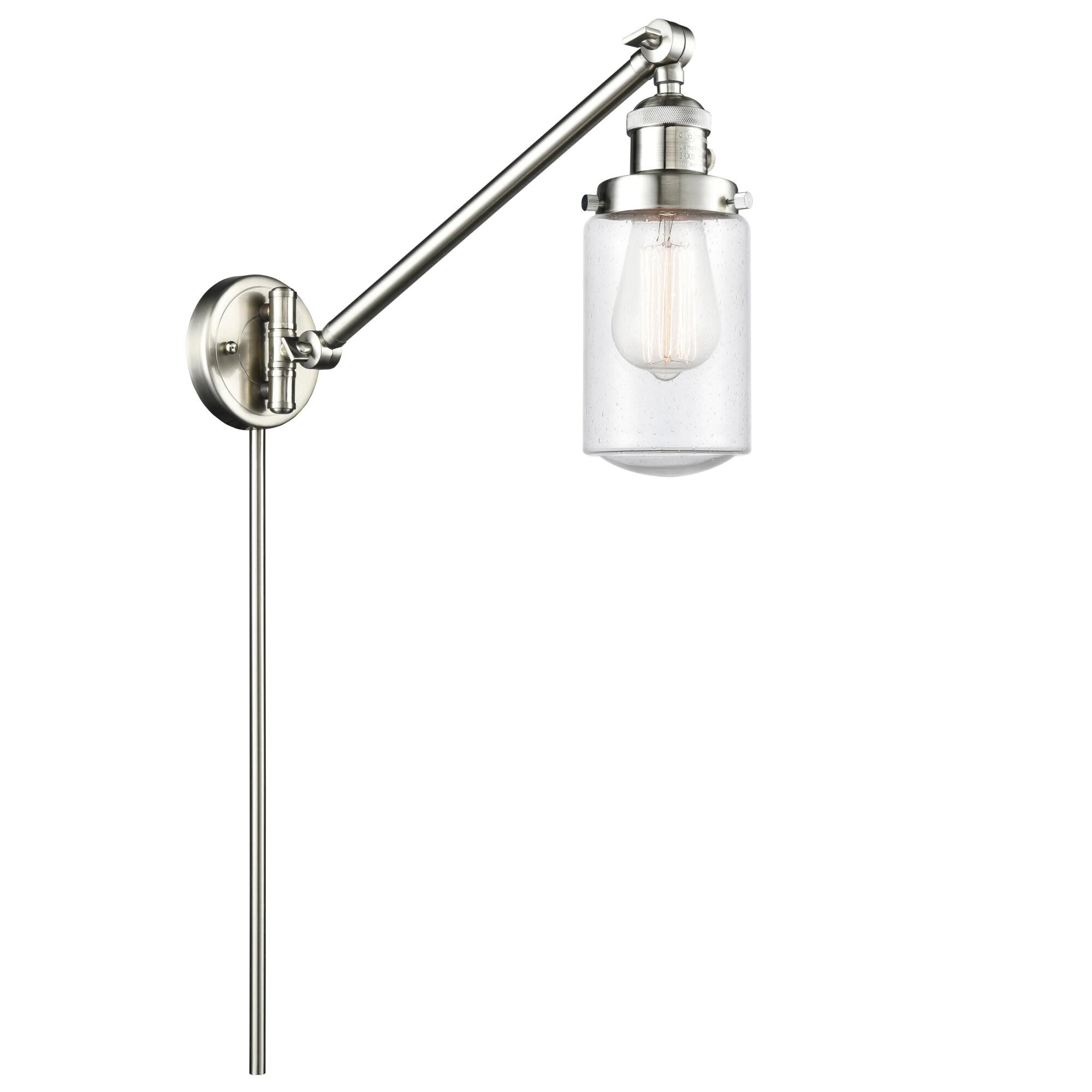 Shown in Brushed Satin Nickel finish and Seeded Seedy Dover glass and Bulb Tint - Amber accent