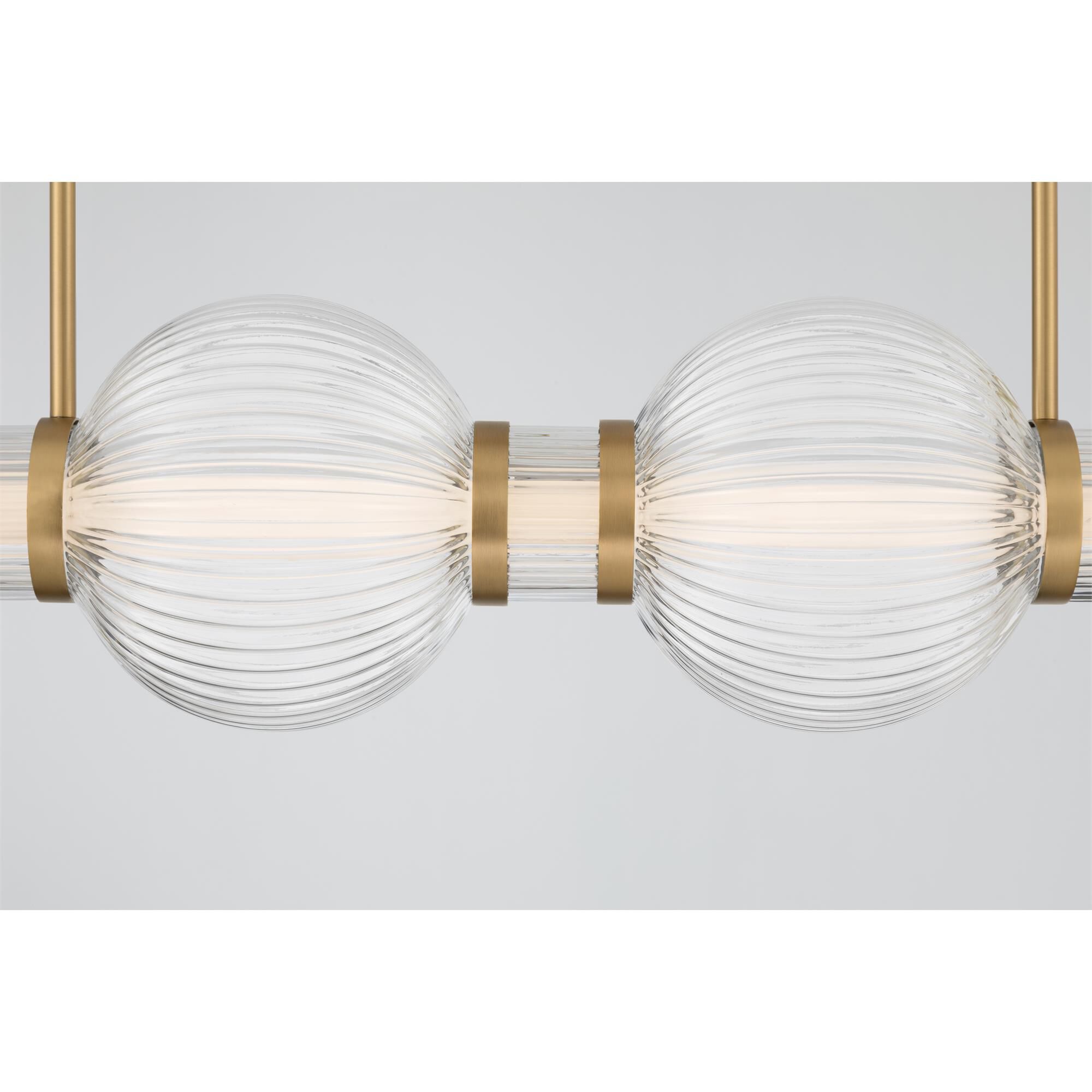 Shown in Legacy Brass finish and Clear Ribbed glass
