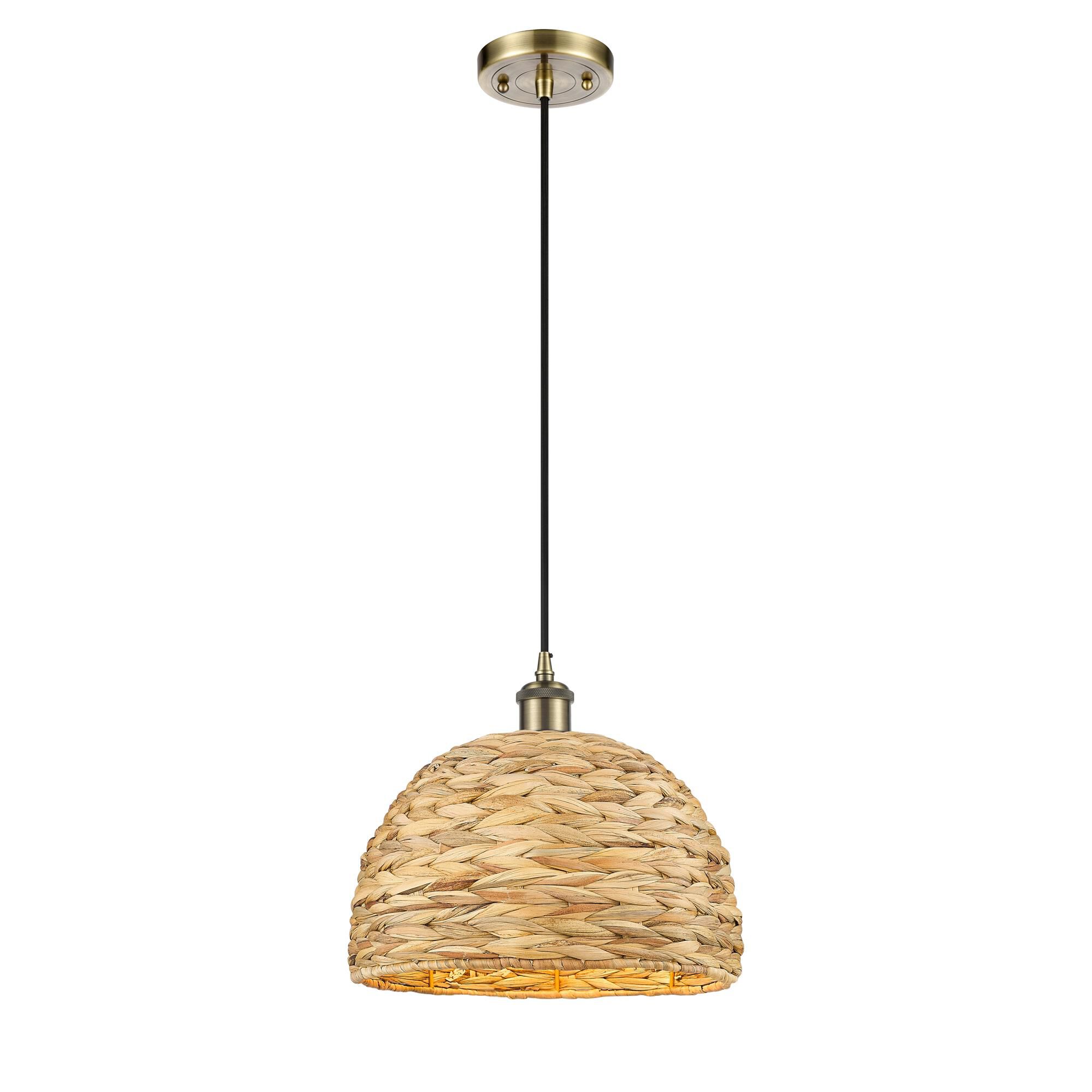 Shown in Antique Brass finish and Natural shade