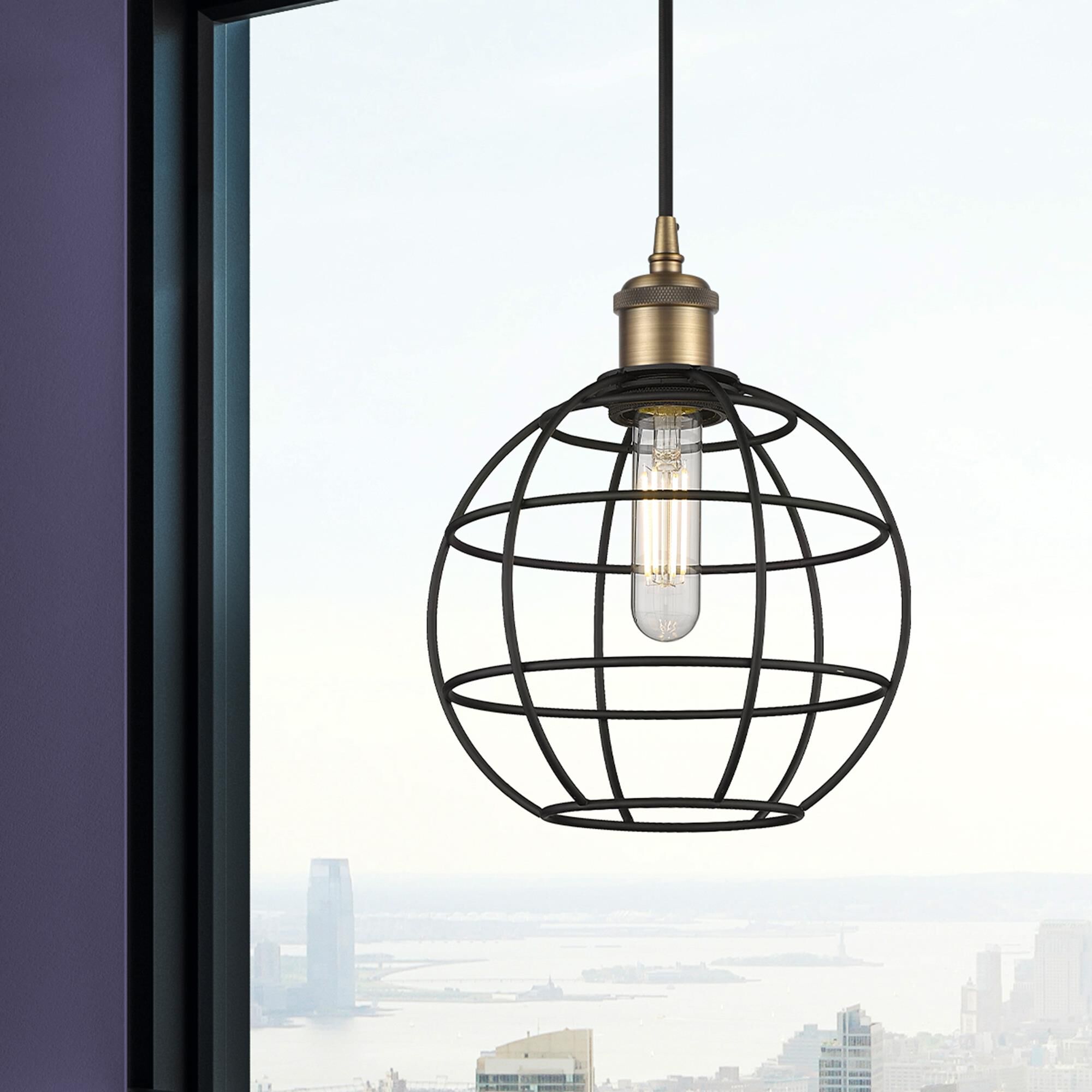 Shown in Brushed Brass finish and Matte Black Steel shade