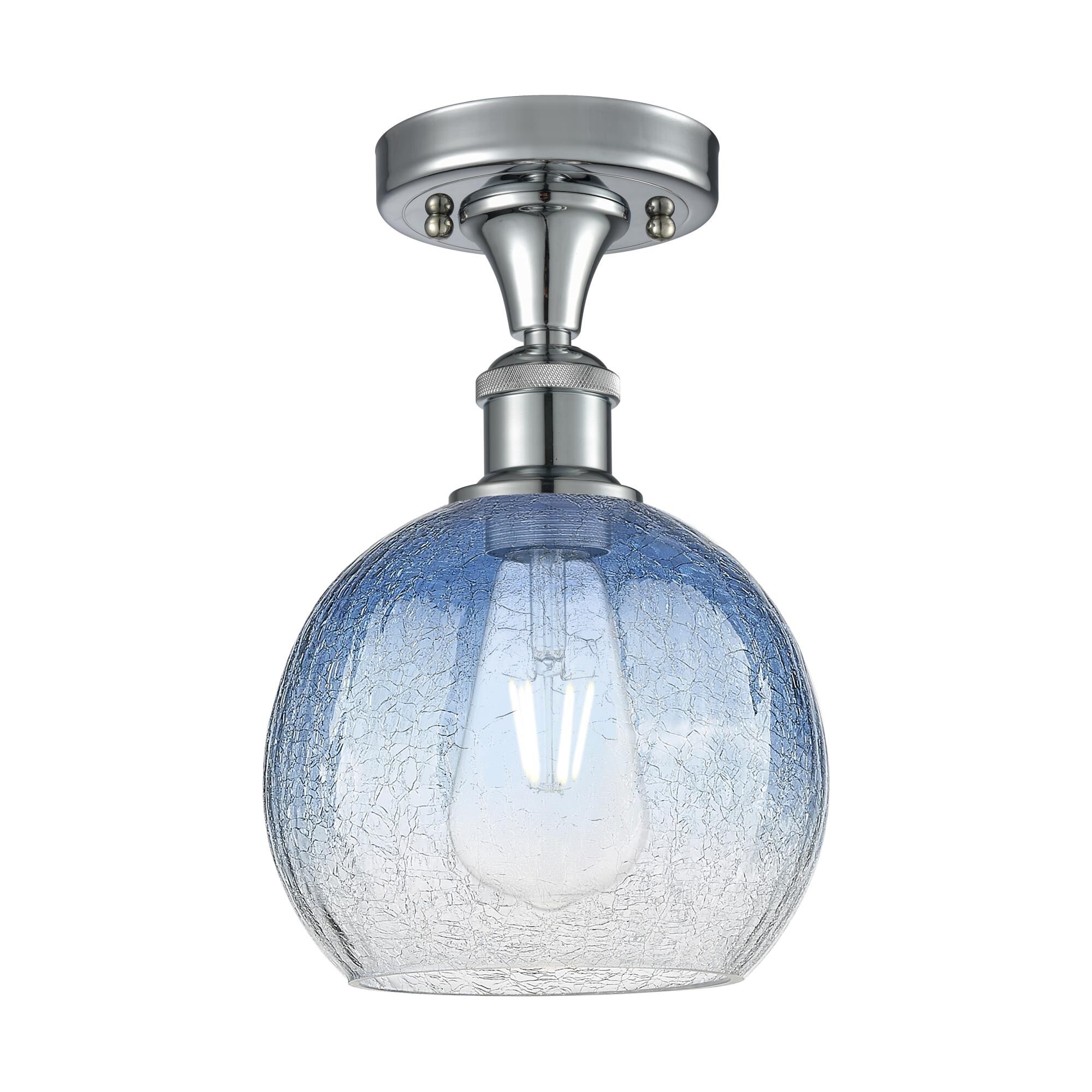 Shown in Polished Chrome finish and Sapphire Blue glass