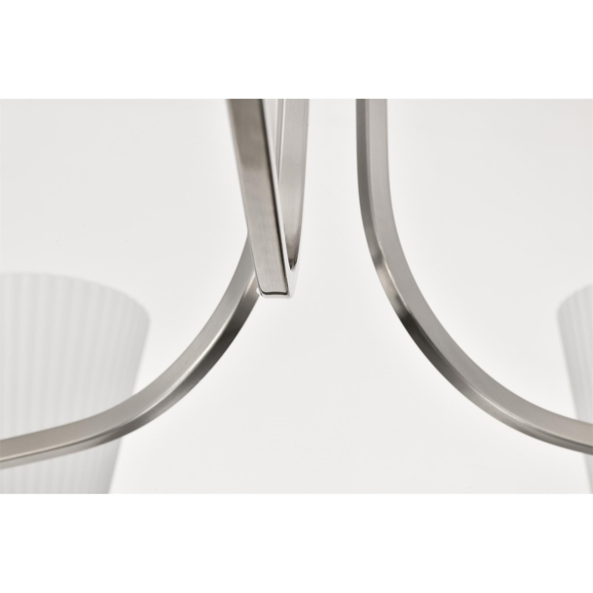 Shown in Brushed Nickel finish and Ribbed White glass
