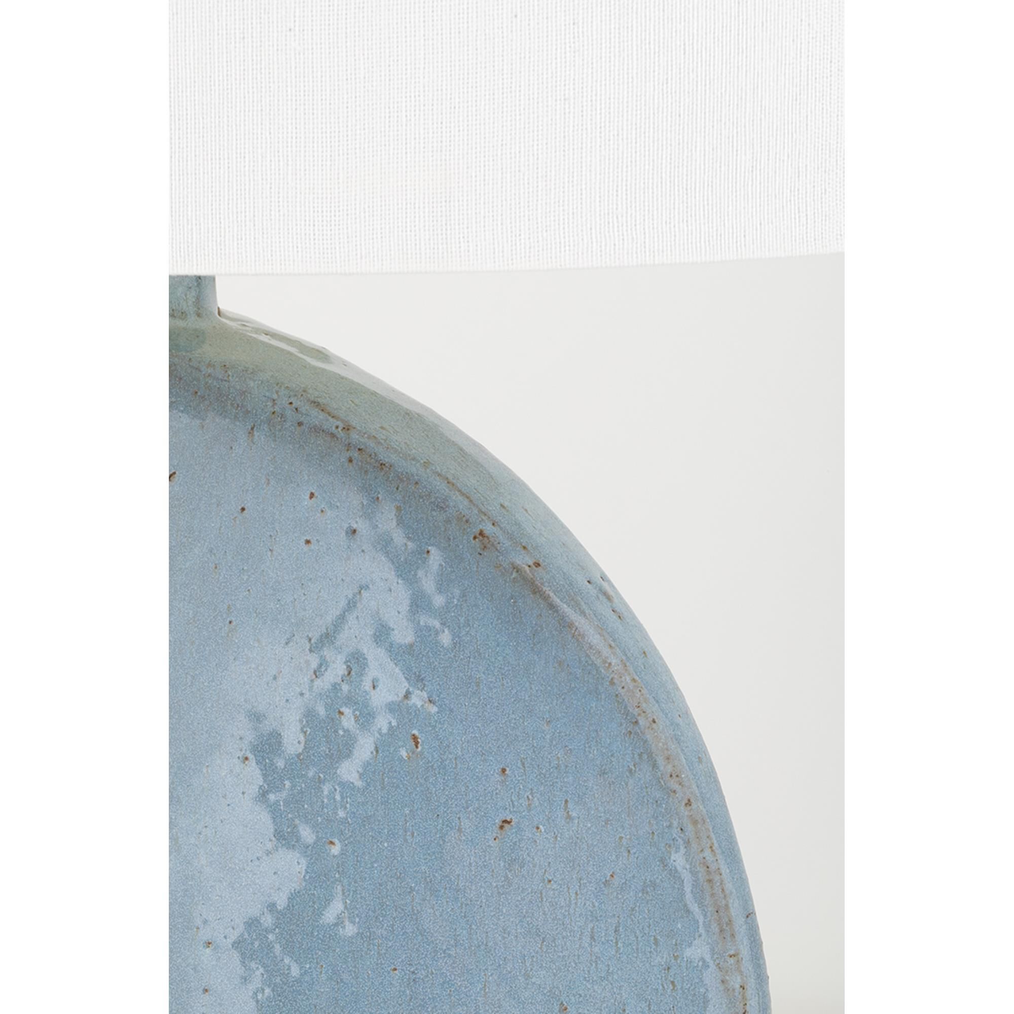 Shown in Aged Brass - Gray finish and Belgian Linen shade