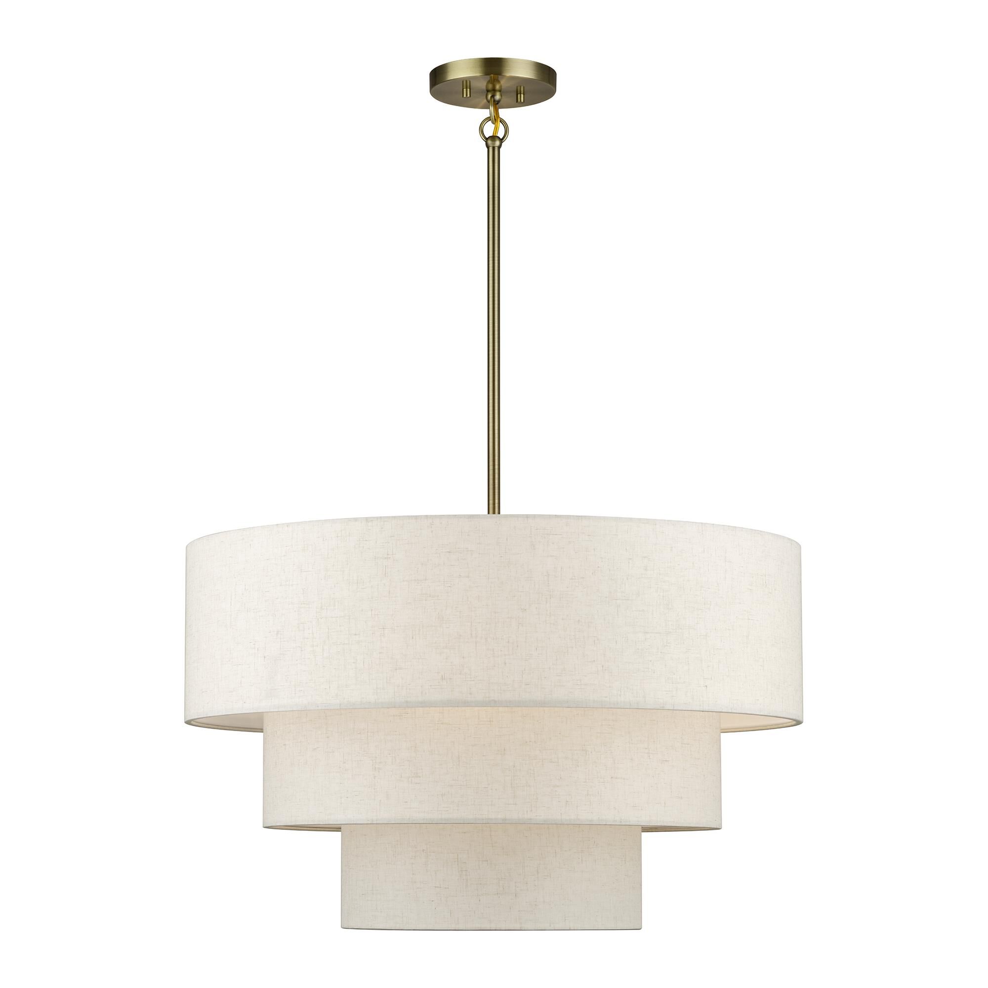 Shown in Antique Brass finish and Hand Crafted Oatmeal Color Fabric with White Color Inside shade