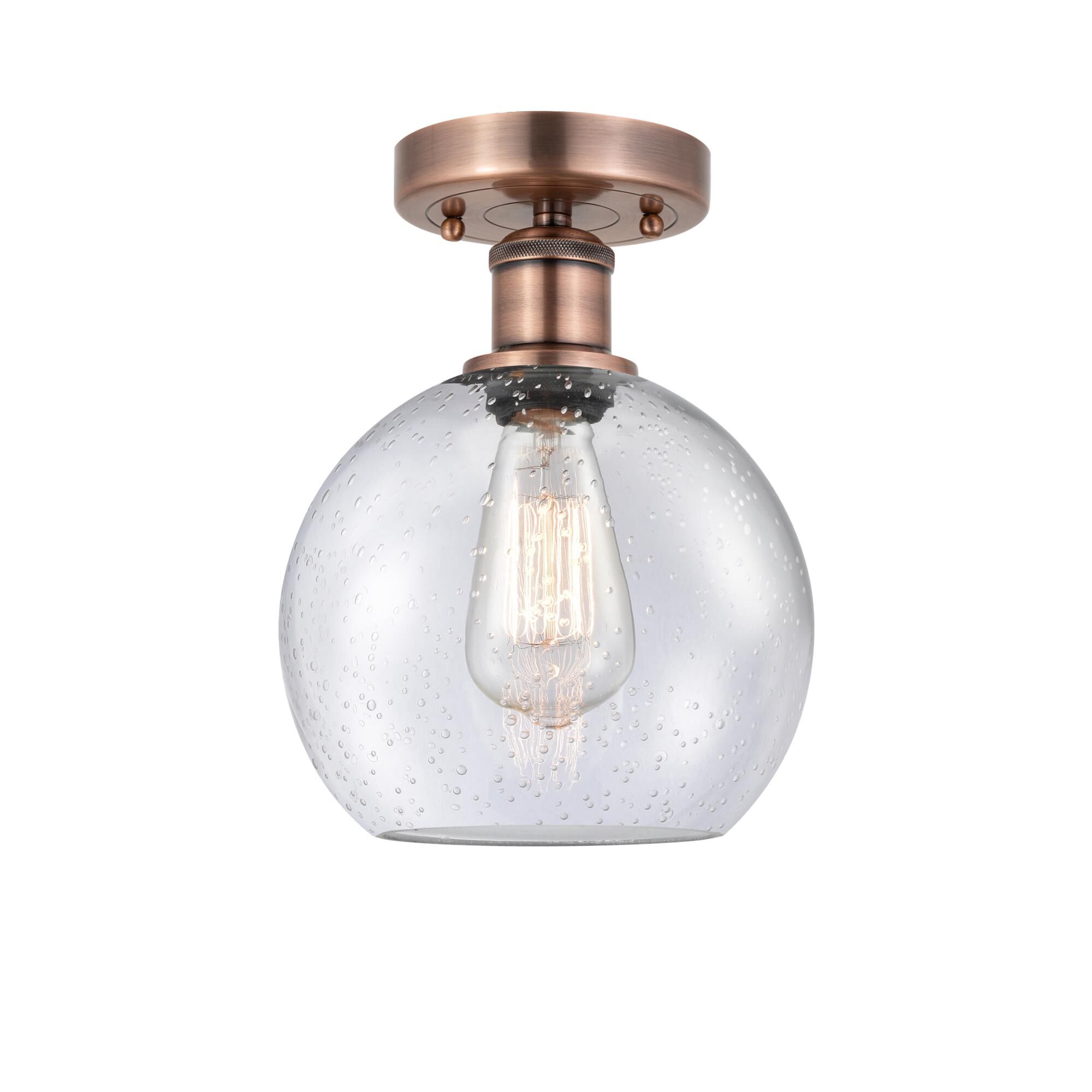 Shown in Antique Copper finish and Seedy glass