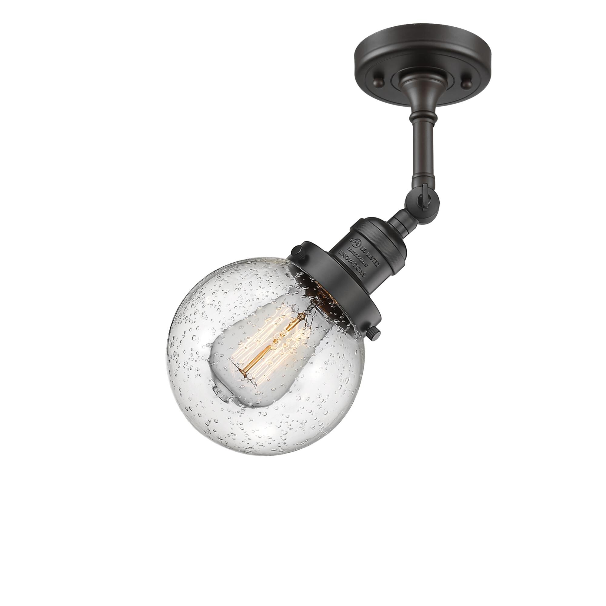 Shown in Oil Rubbed Bronze finish and Seedy glass and No Accent accent