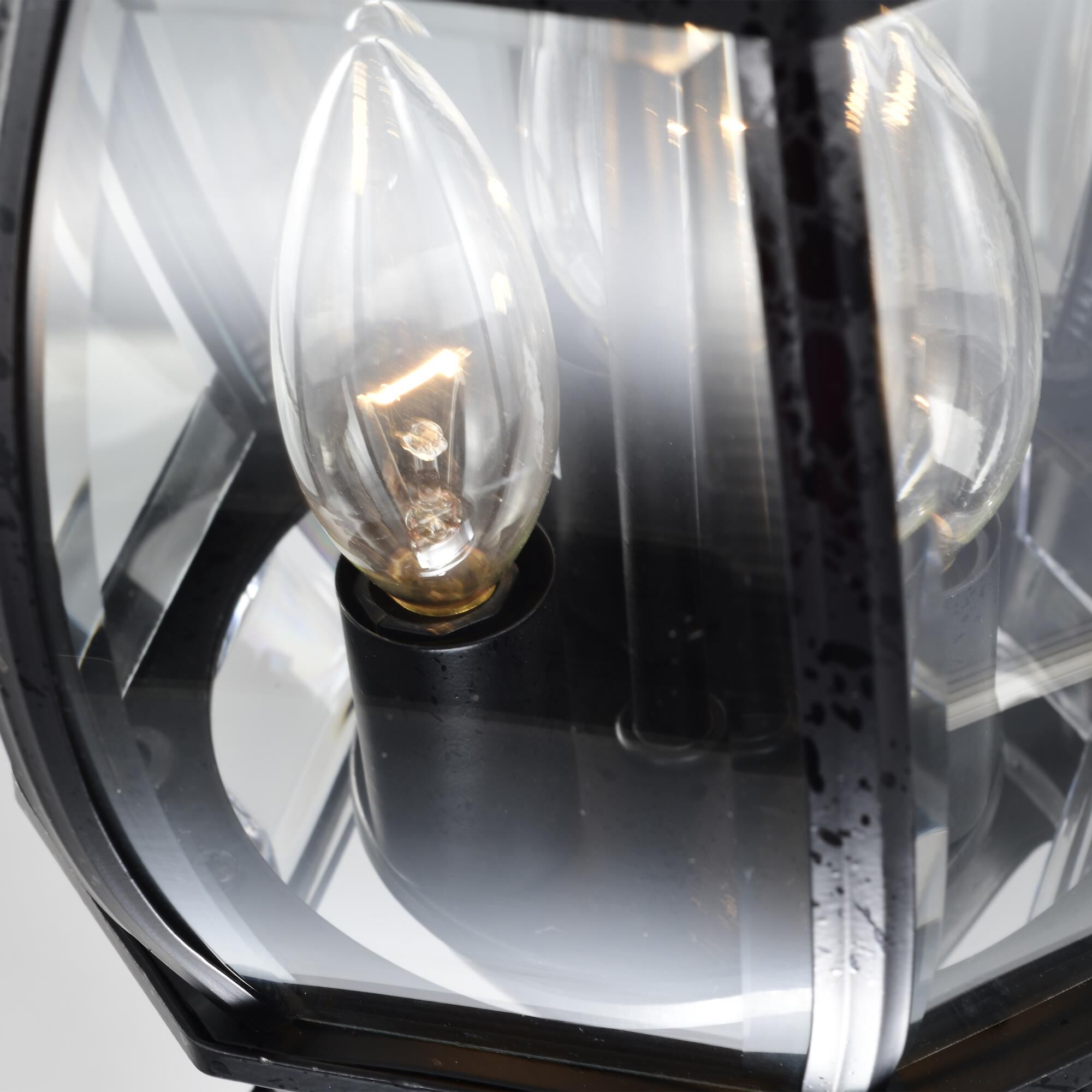 Shown in Textured Black finish and Clear Beveled Panels glass