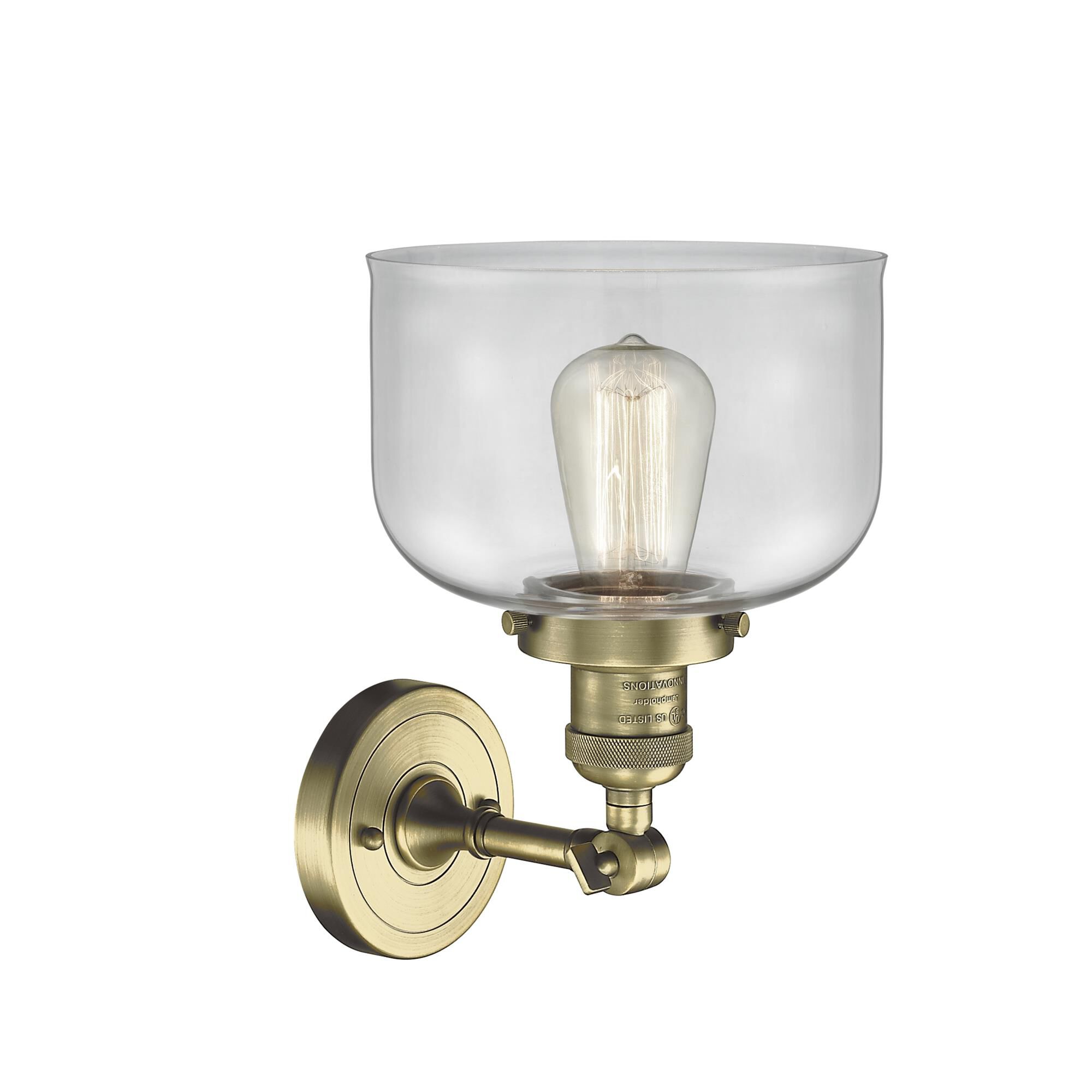 Shown in Antique Brass finish and Clear glass