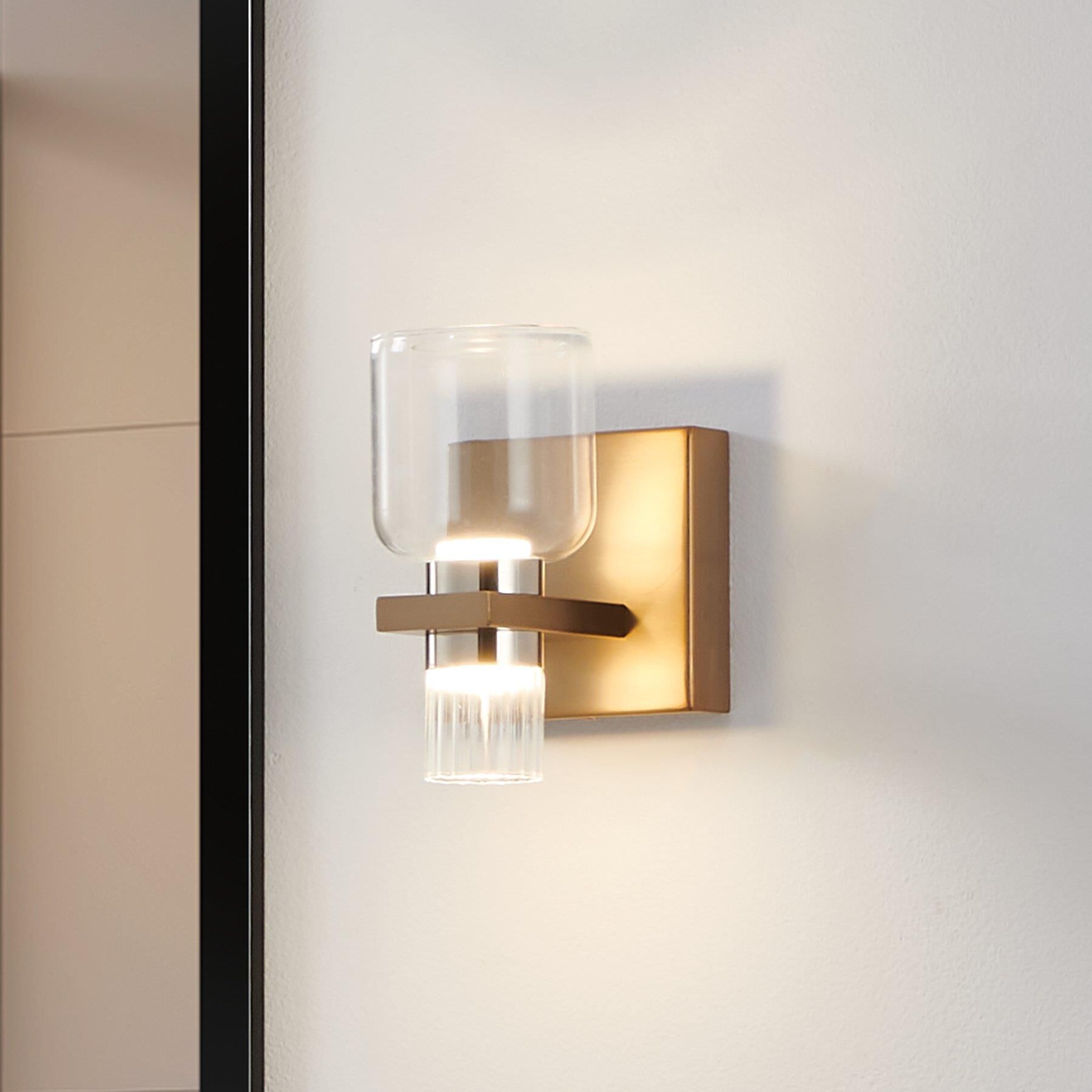 Shown in Champagne Gold finish and Clear, Clear Ribbed glass