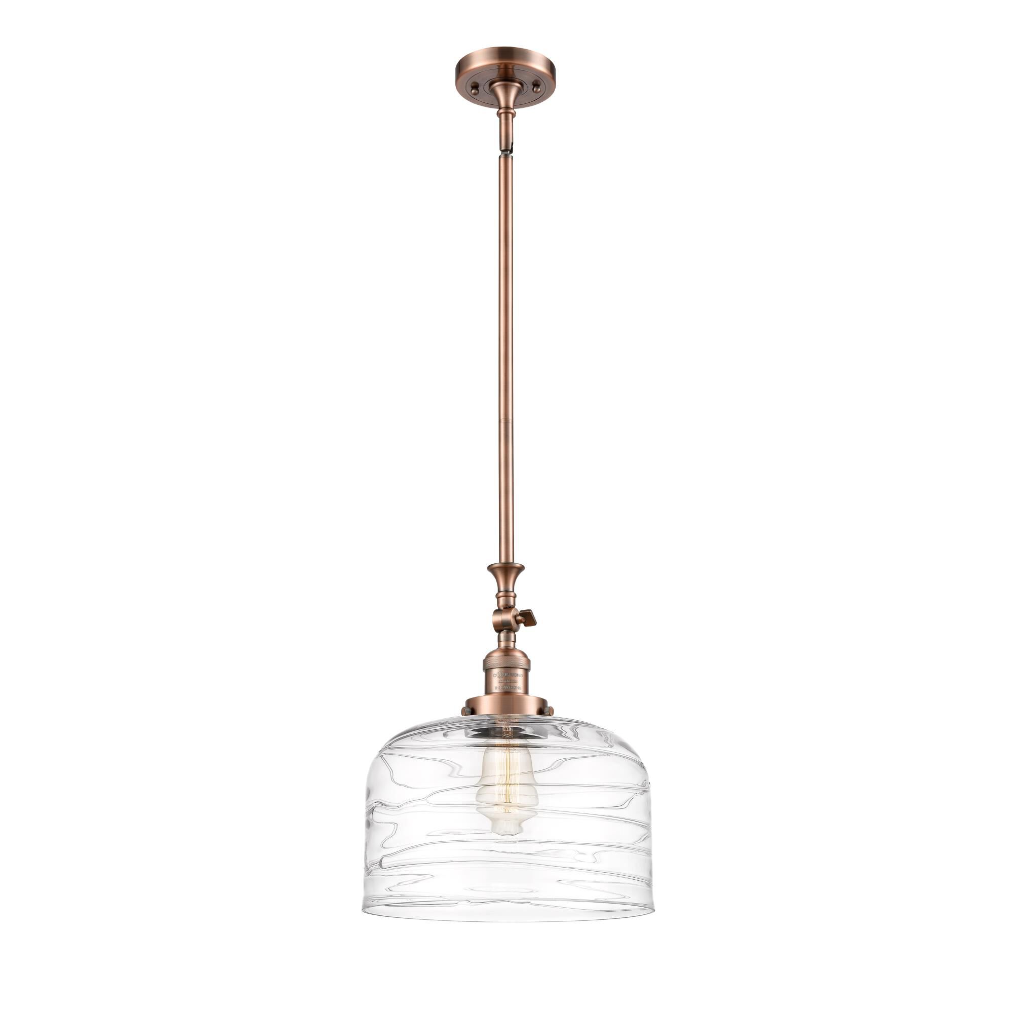 Shown in Antique Copper finish and Clear Deco Swirl X-Large Bell glass