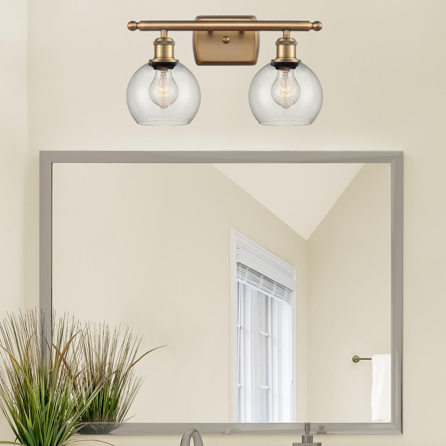 Shown in Brushed Brass finish and Clear Athens glass and No Shade shade