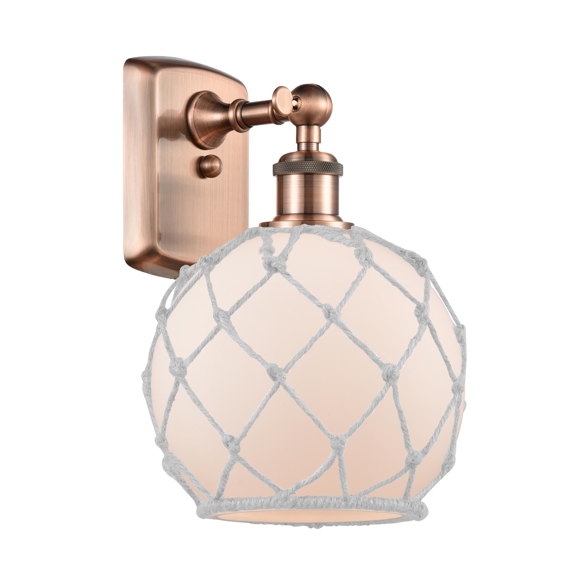 Shown in Antique Copper finish and Sphere glass and Glass And Rope shade