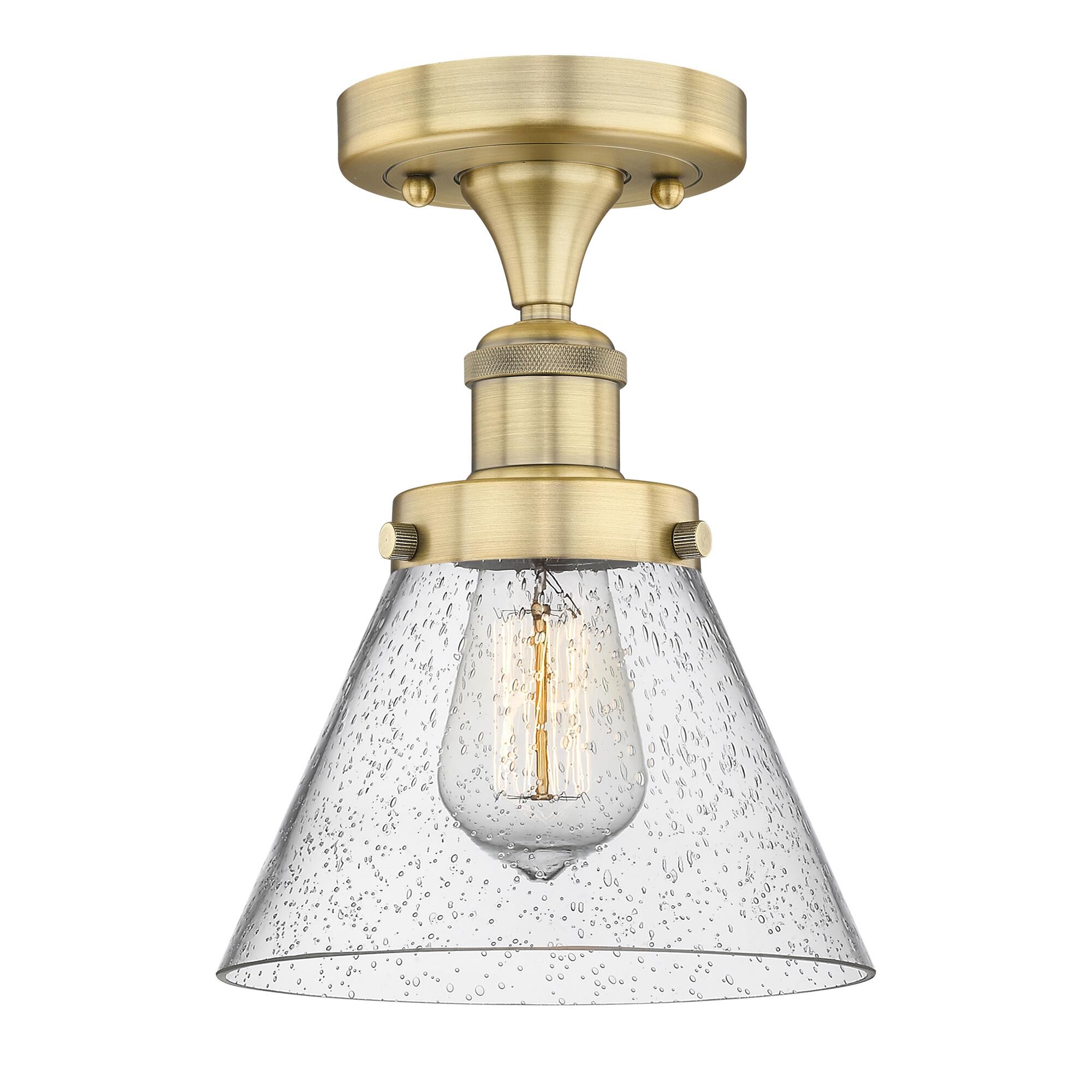 Shown in Brushed Brass finish and Seedy glass
