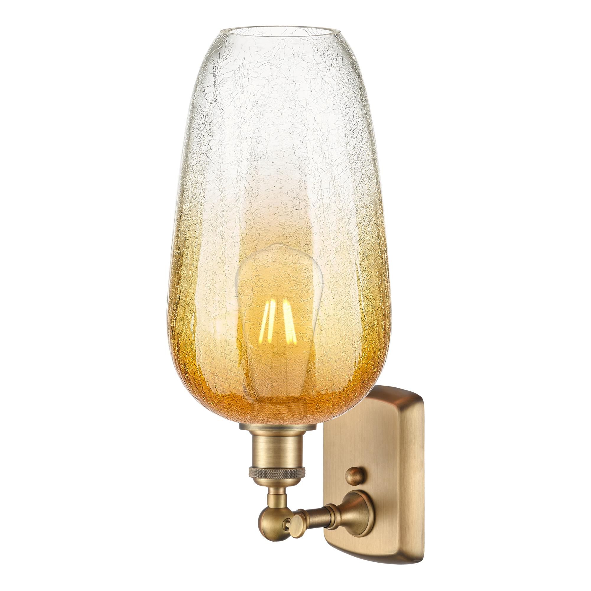 Shown in Brushed Brass finish and Amber glass