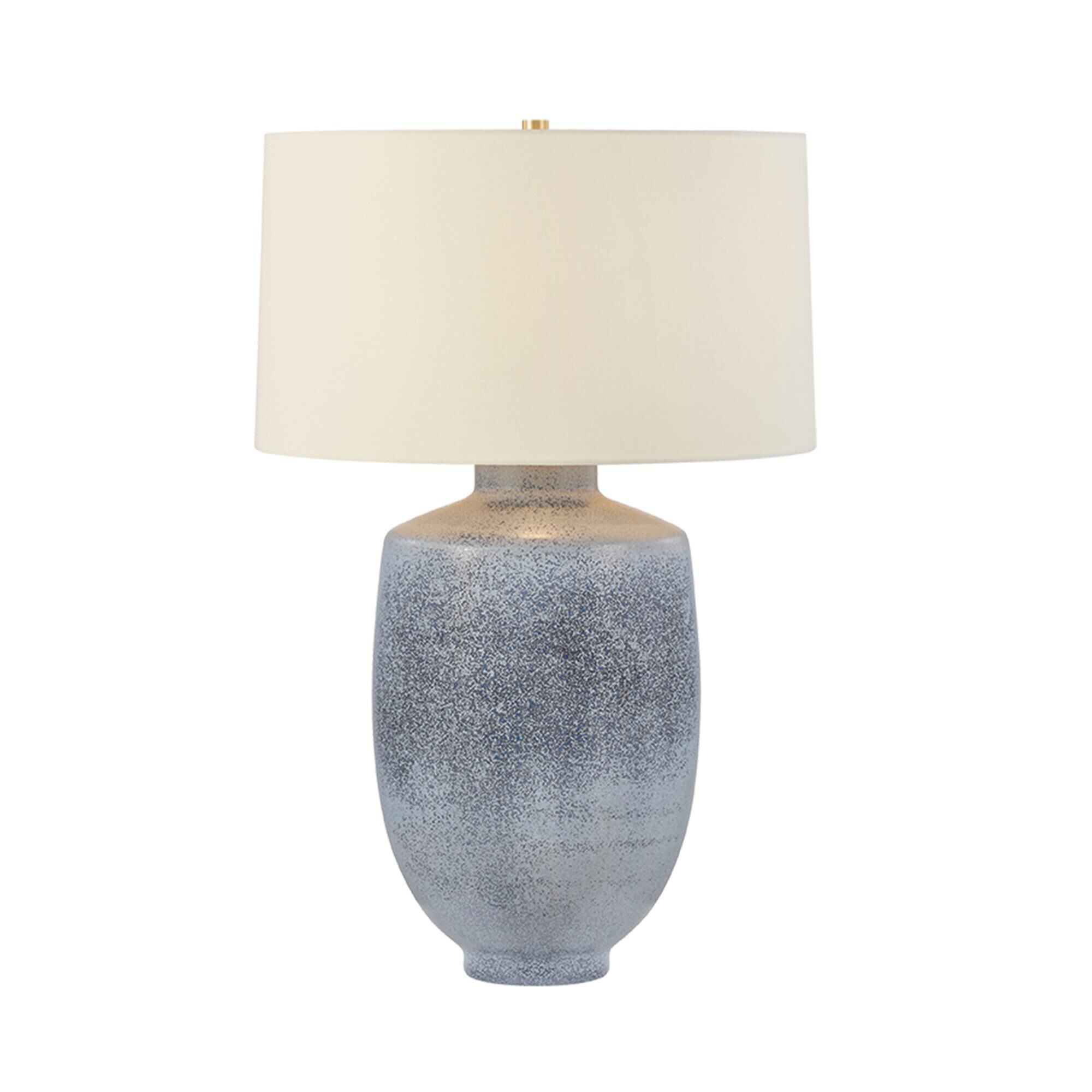 Shown in Aged Brass and Ceramic Oceanside finish and White Linen shade