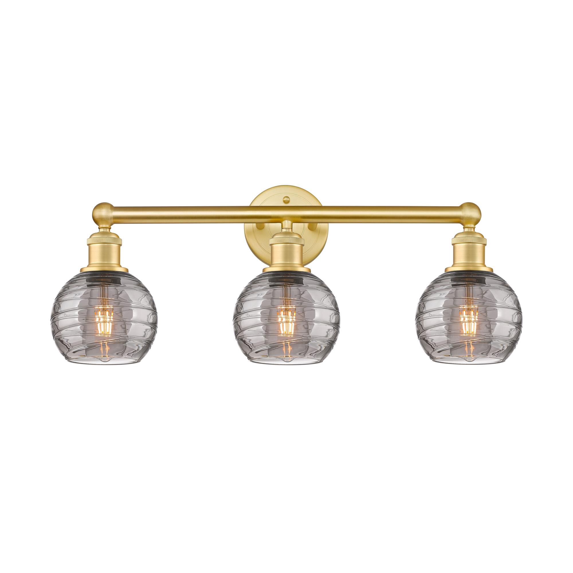 Shown in Satin Gold finish and Light Smoke Deco Swirl glass