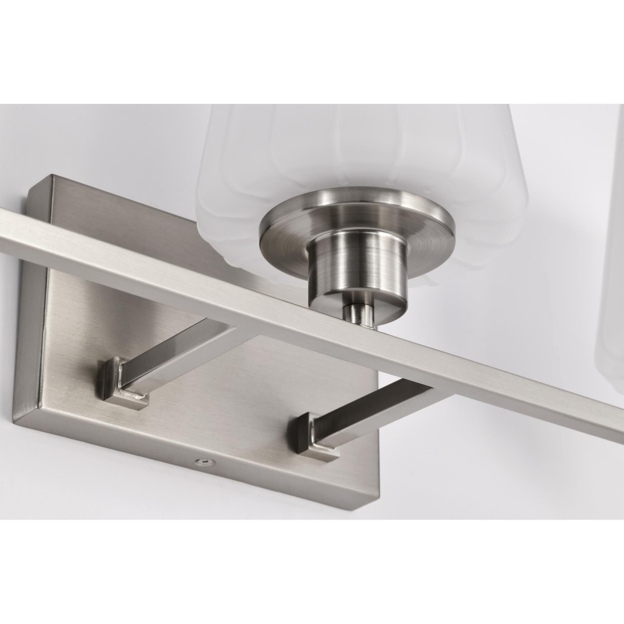 Shown in Brushed Nickel finish and Etched White glass