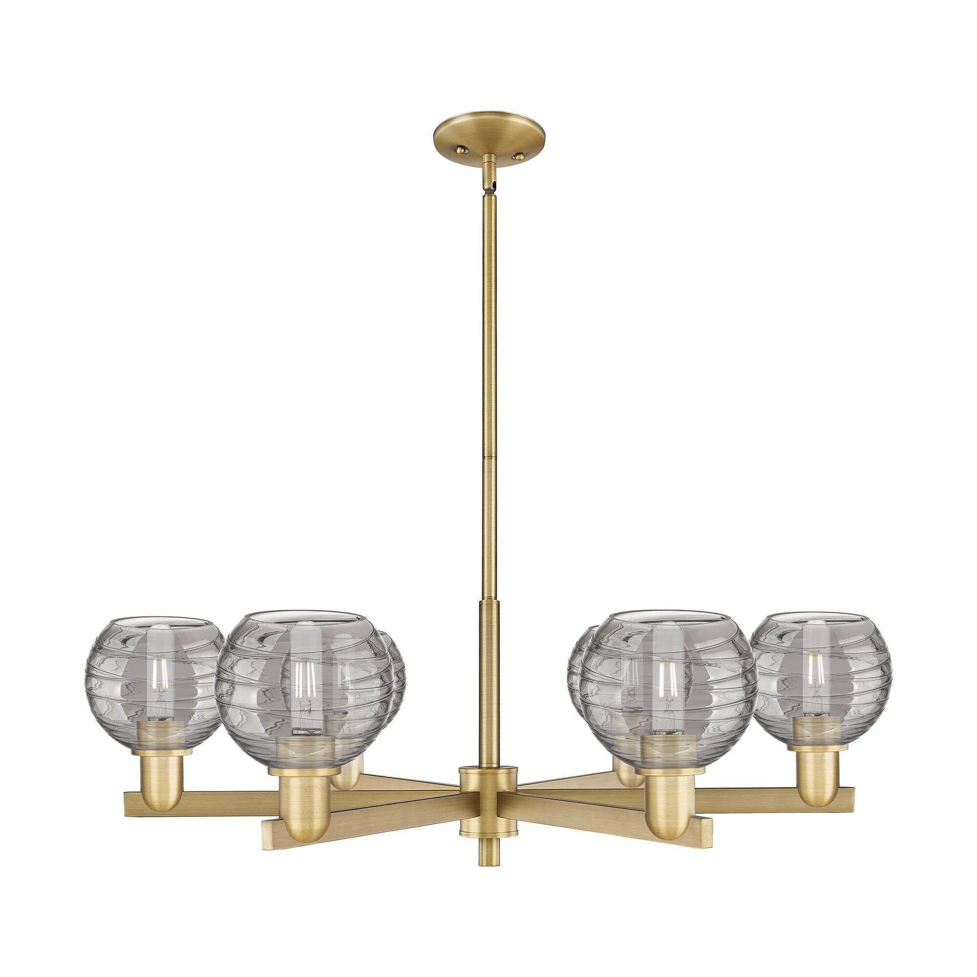 Shown in Brushed Brass finish and Light Smoke Deco Swirl glass