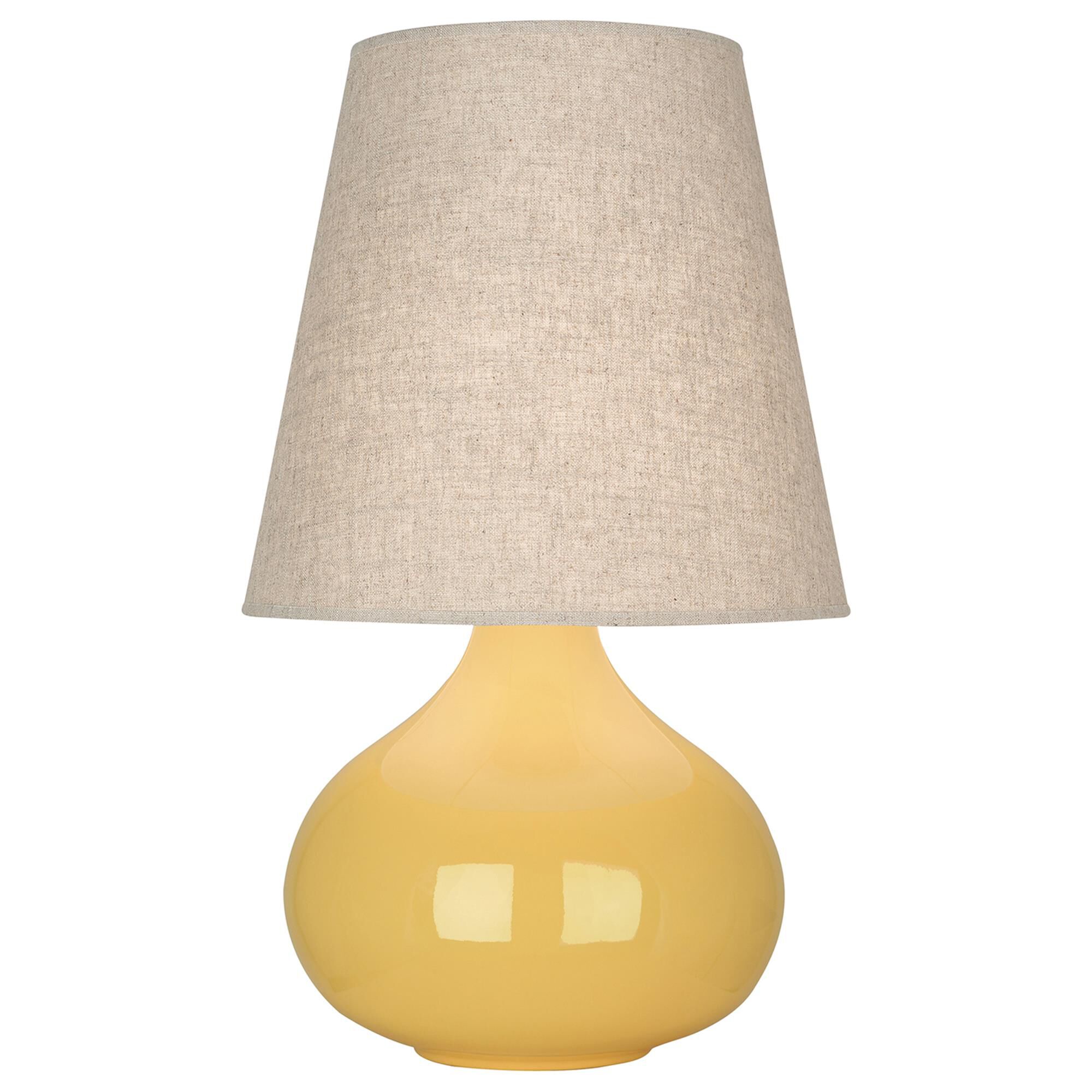 Shown in Sunset Yellow Glazed Ceramic finish and Buff Linen shade