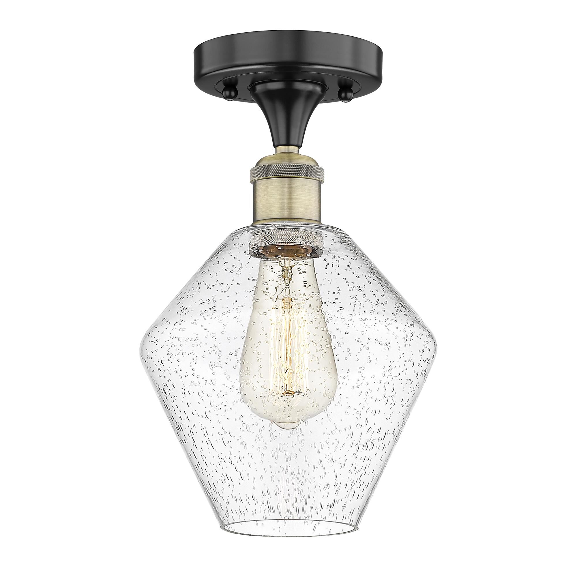 Shown in Black Antique Brass finish and Seedy glass