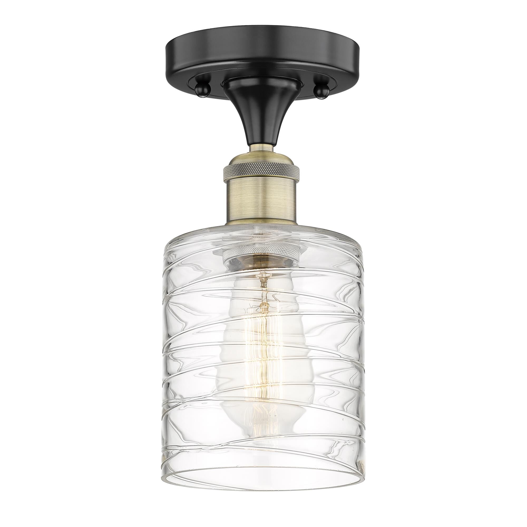 Shown in Black Antique Brass finish and Deco Swirl glass