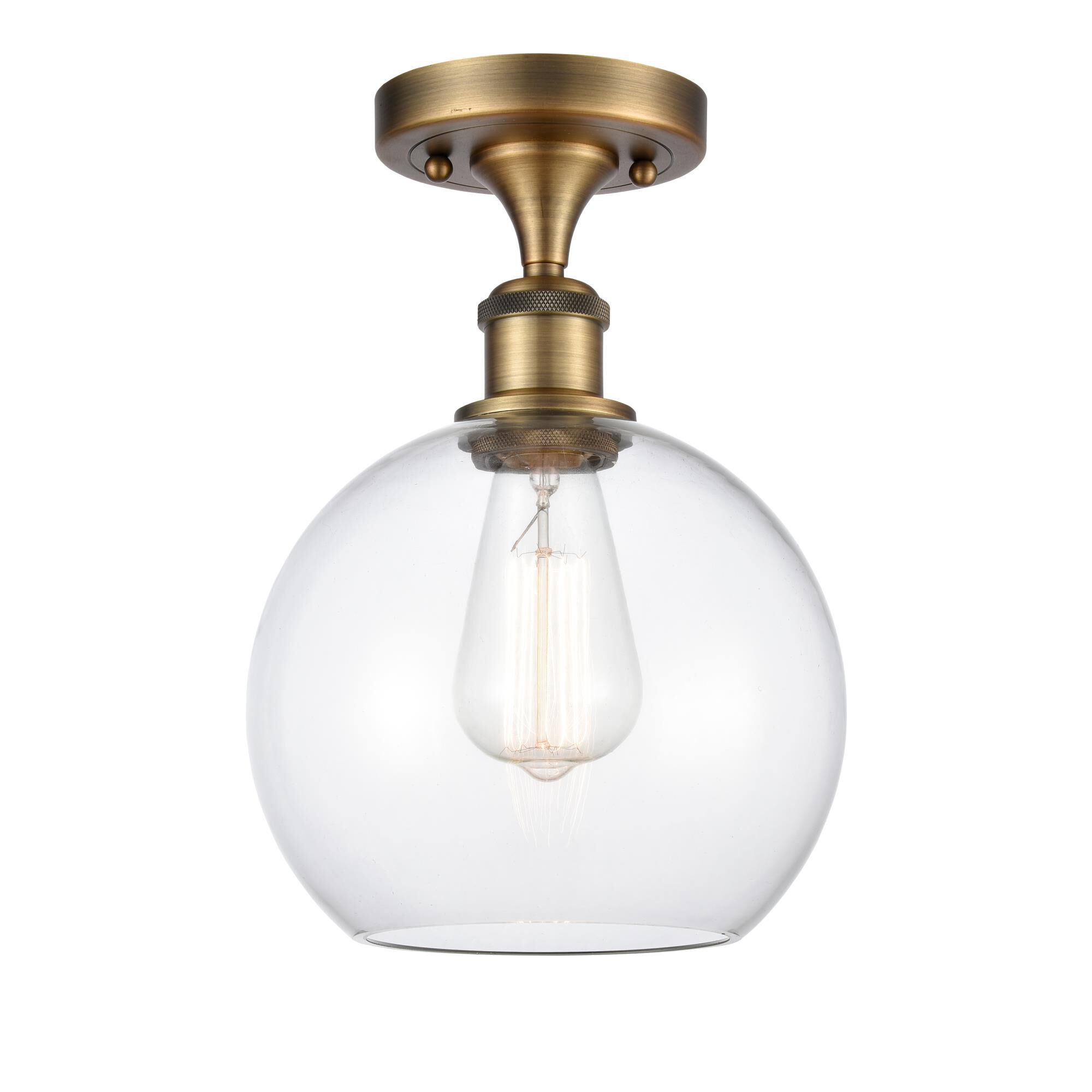 Shown in Brushed Brass finish and Sphere glass and Glass shade