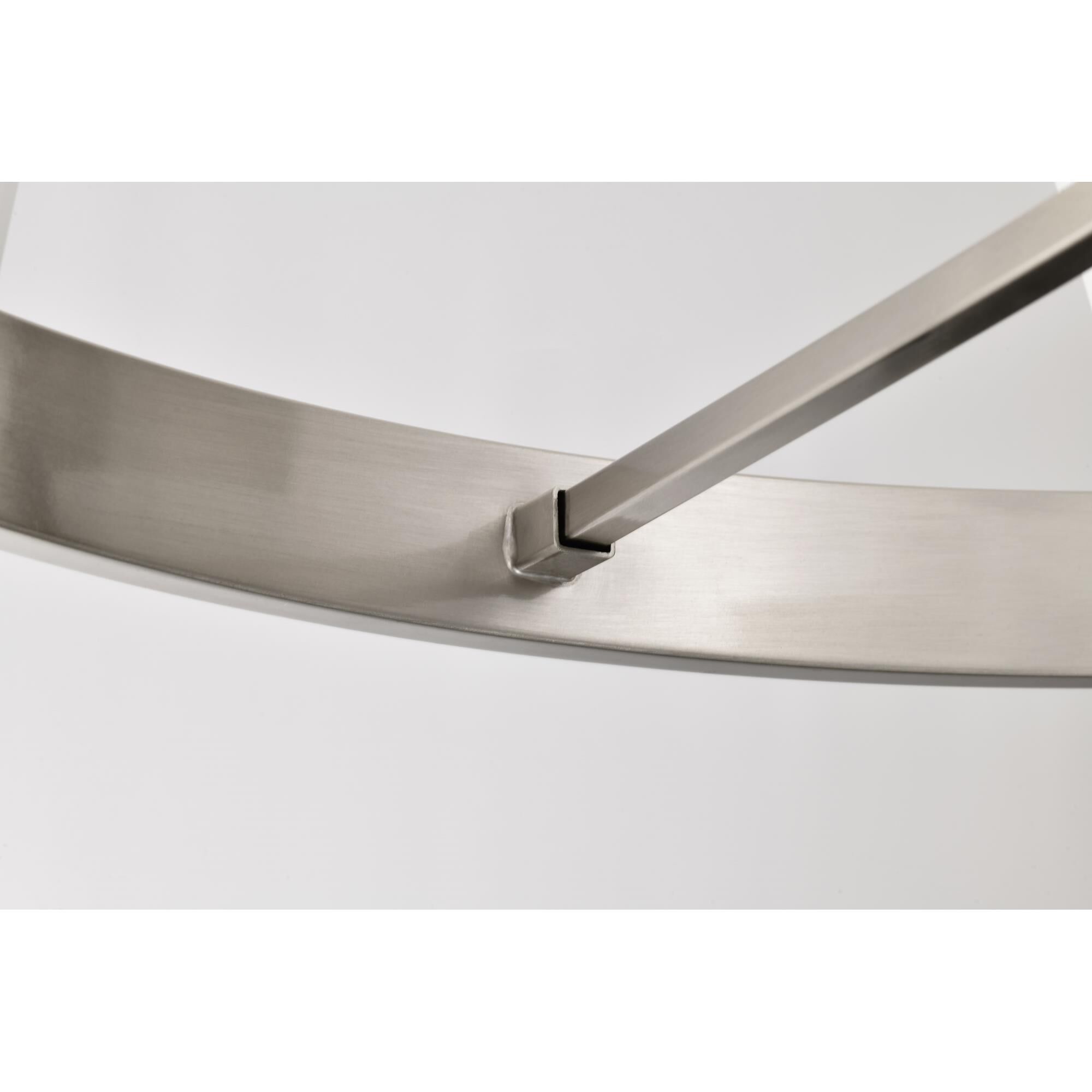 Shown in Brushed Nickel finish and Ribbed White glass