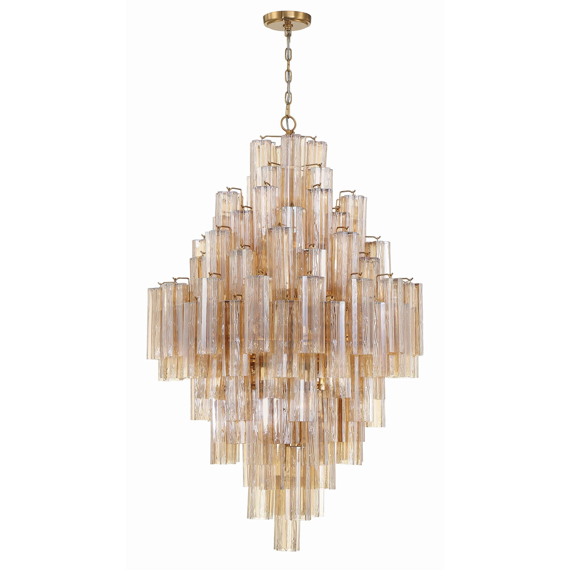 Shown in Aged Brass finish and Tronchi Glass Amber crystal
