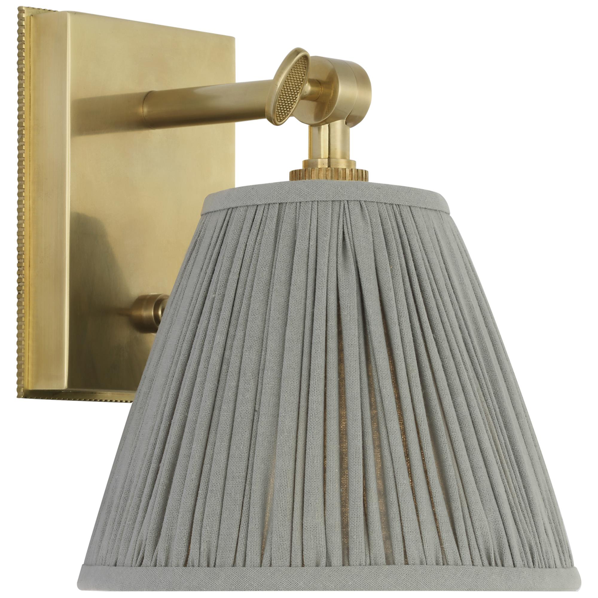 Shown in Soft Brass finish and Blue Linen Pleated shade