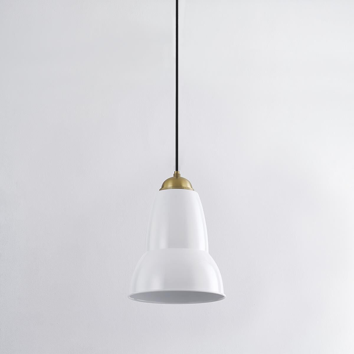 Shown in Aged Brass finish and Glossy White Metal shade