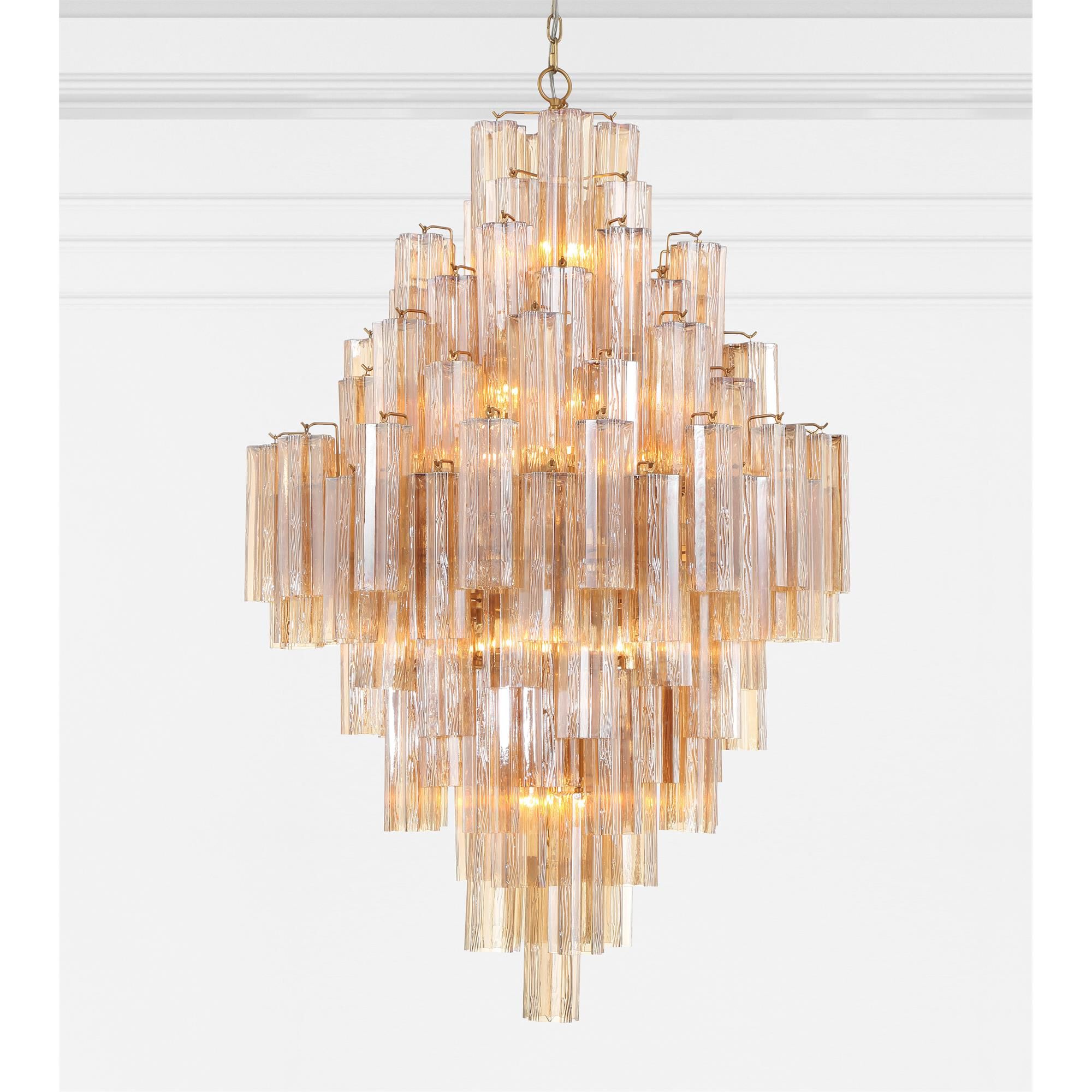Shown in Aged Brass finish and Tronchi Glass Amber crystal