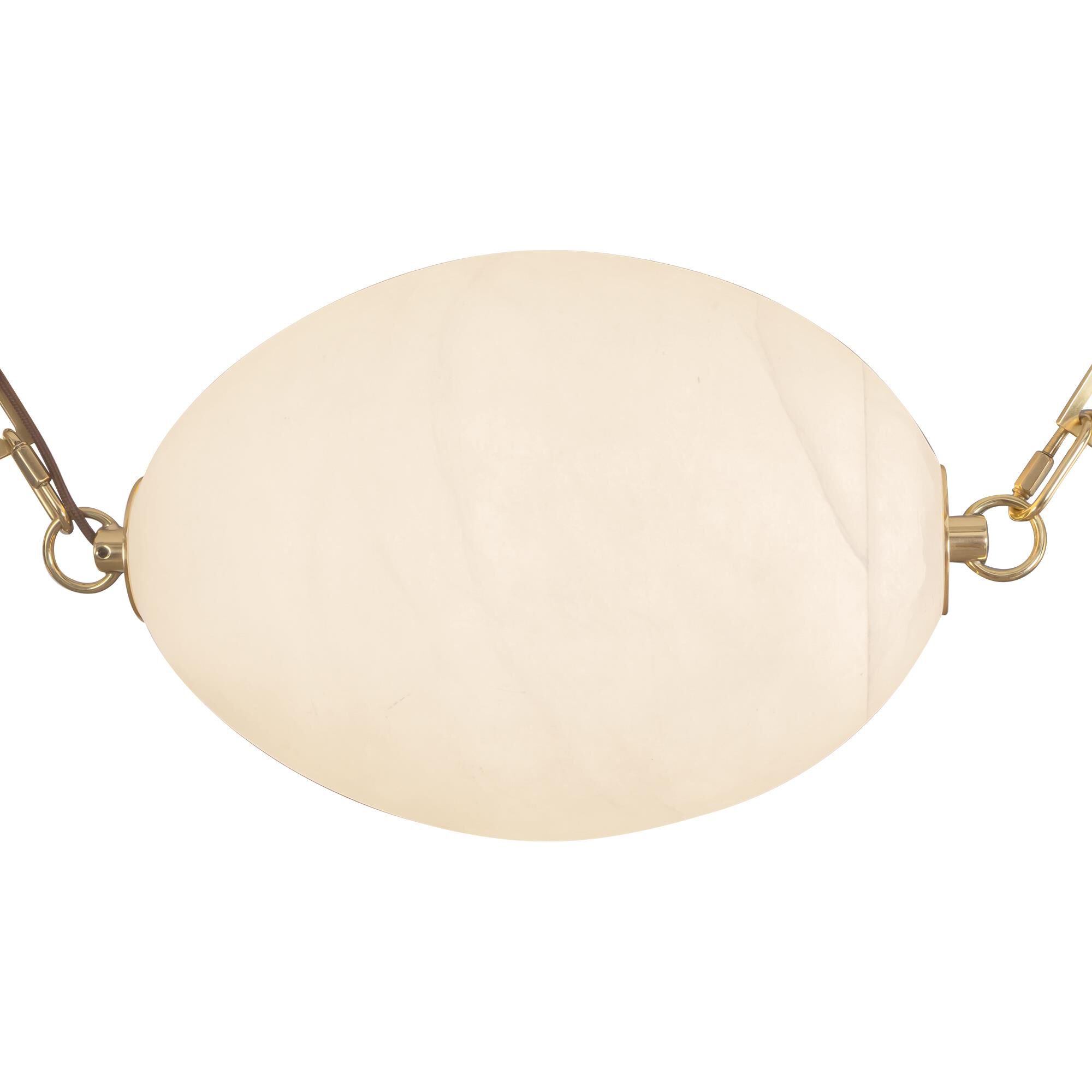 Shown in Patina Brass finish and Alabaster glass