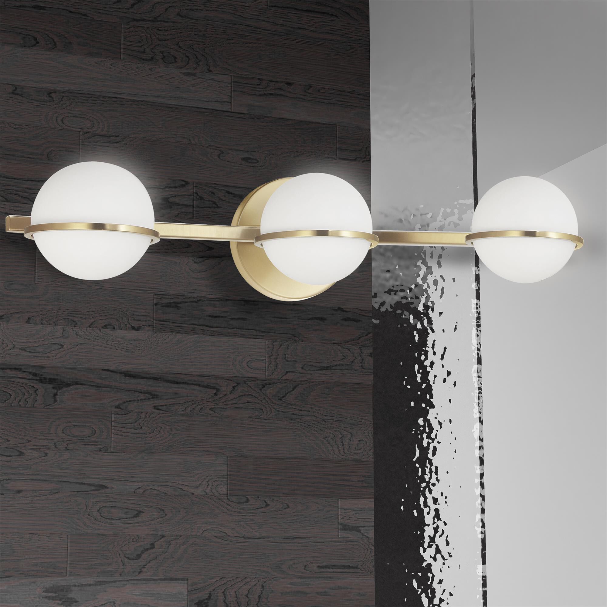 Shown in Aged Brass and White finish and White Globe glass