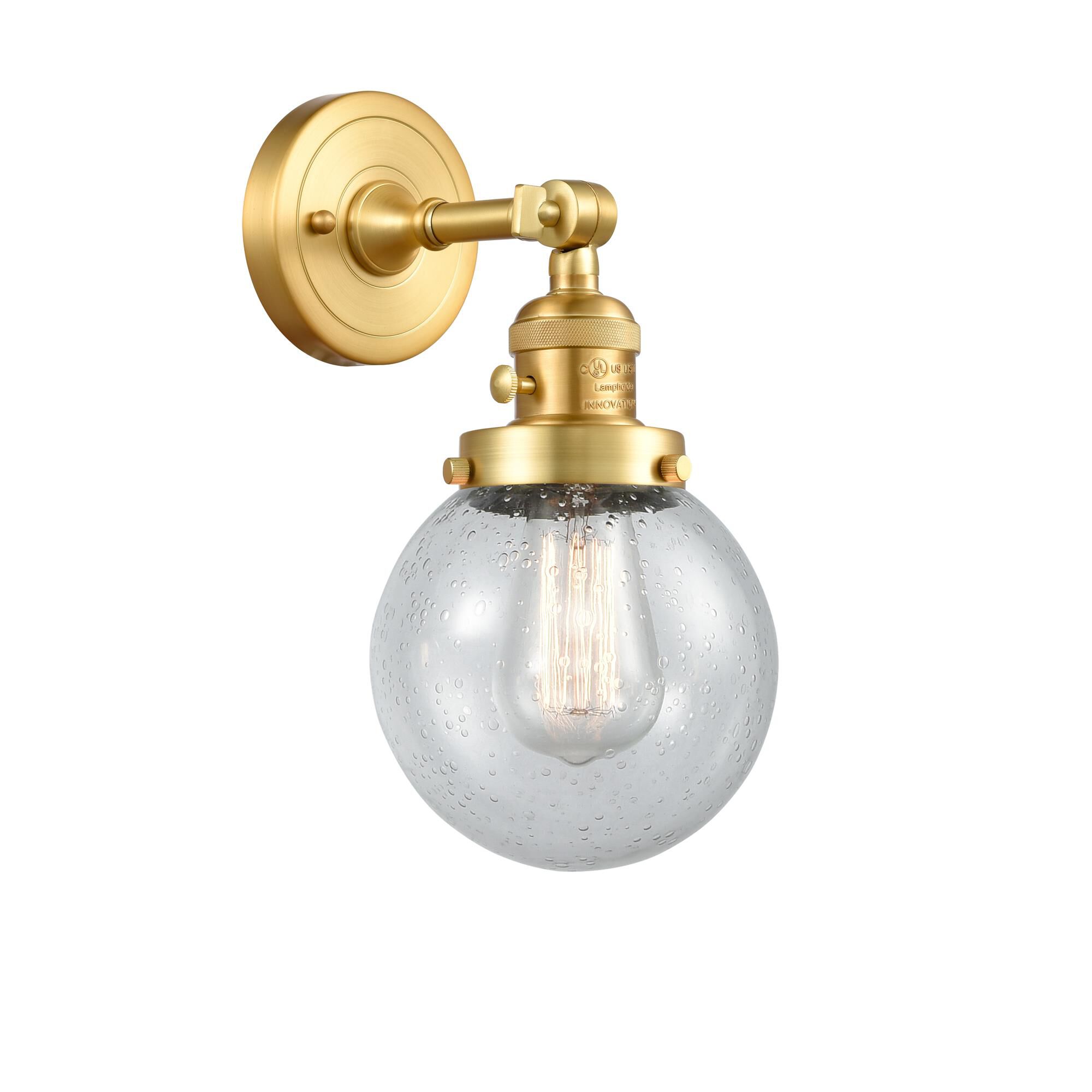 Shown in Satin Gold finish and Seedy Beacon glass