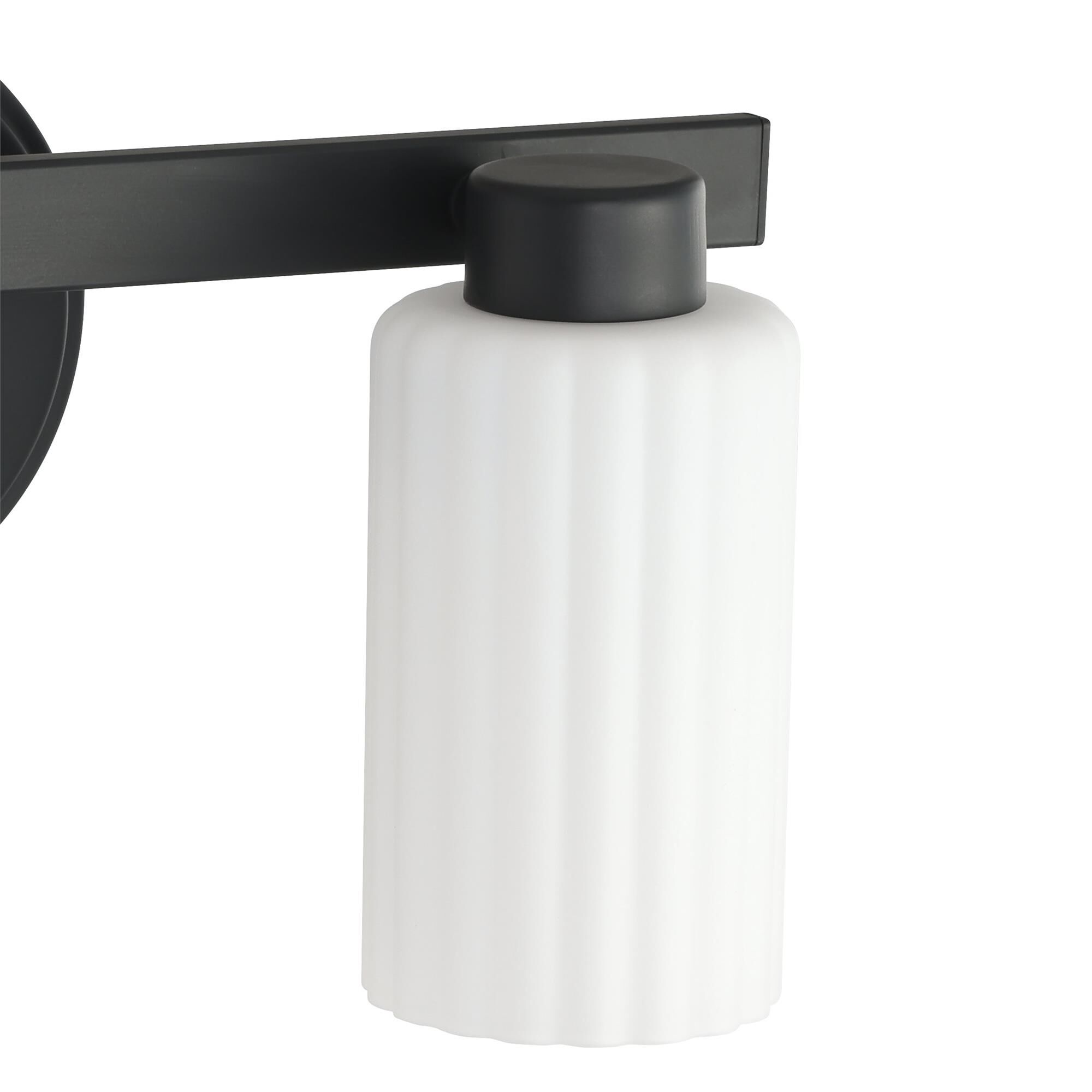 Shown in Matte Black finish and Etched Opal Ribbed glass