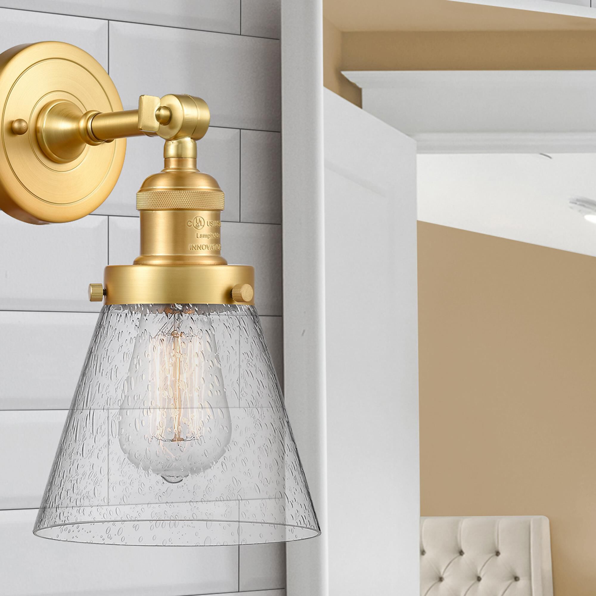 Shown in Satin Gold finish and Seedy Small Cone glass