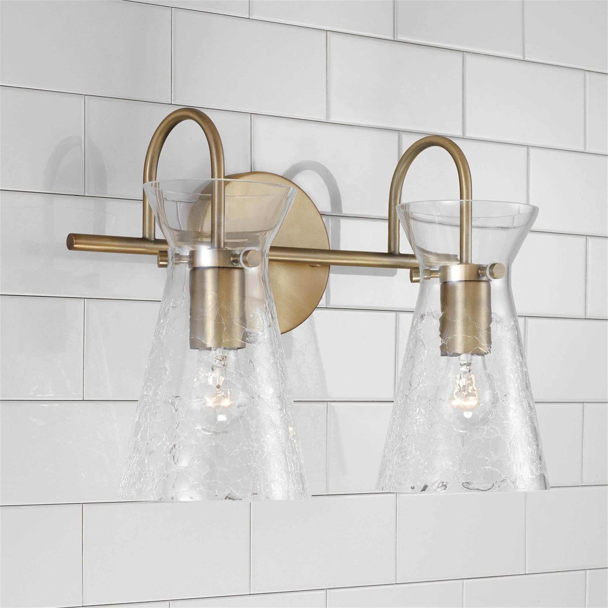Shown in Aged Brass finish and Clear Half-Crackle glass