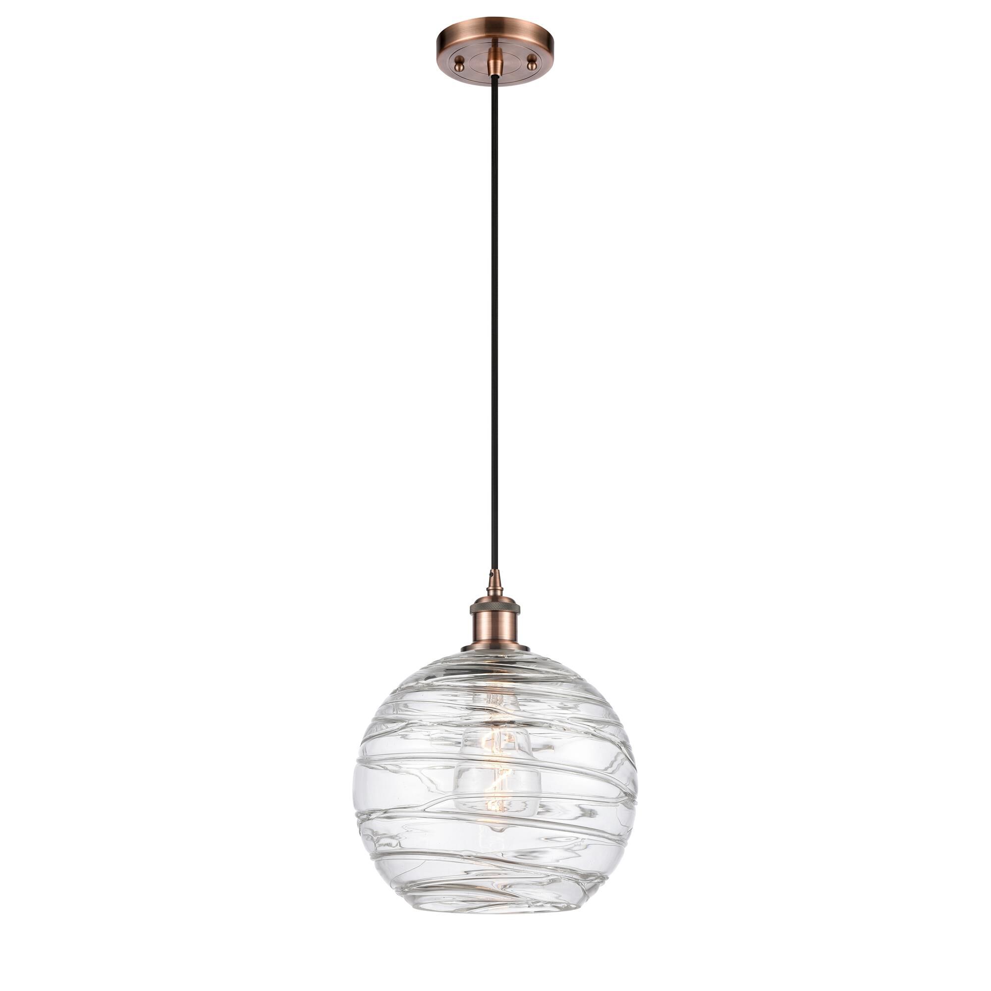 Shown in Antique Copper finish and Clear Large Deco Swirl glass