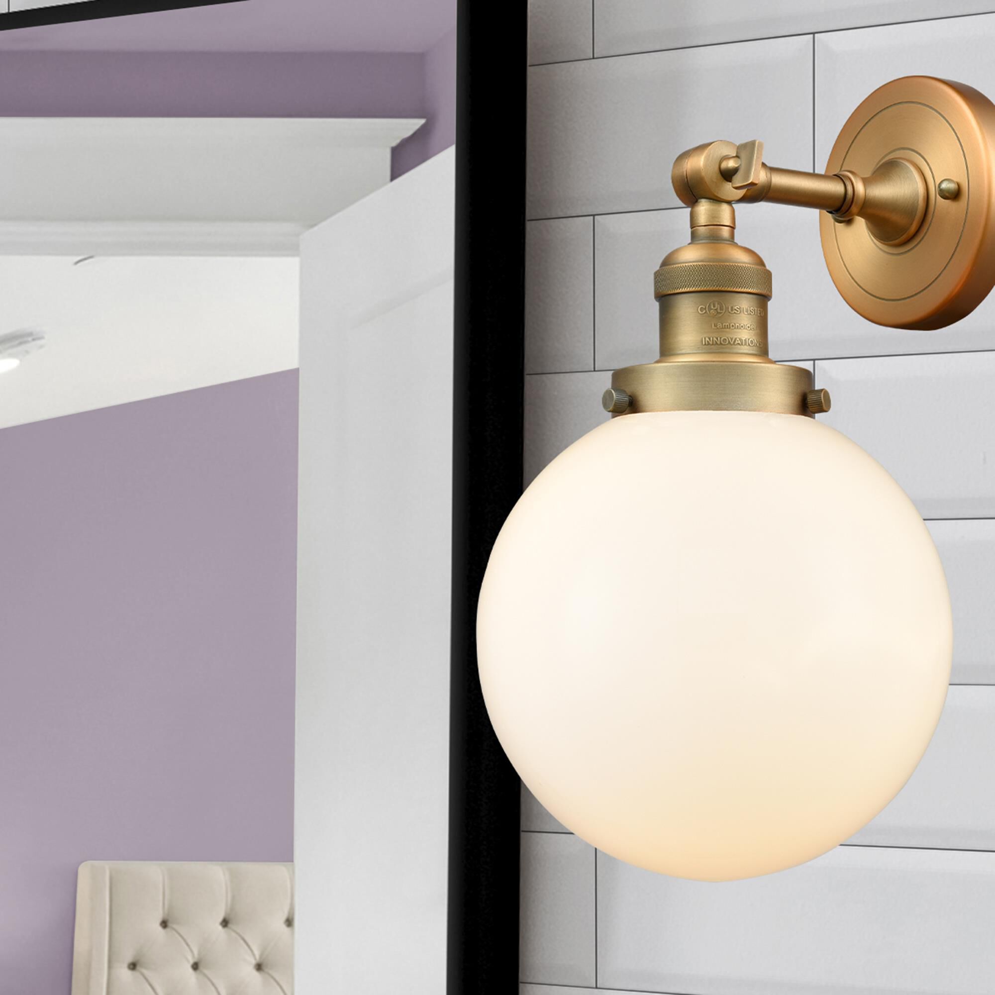 Shown in Brushed Brass finish and Matte White Cased glass and No Accent accent