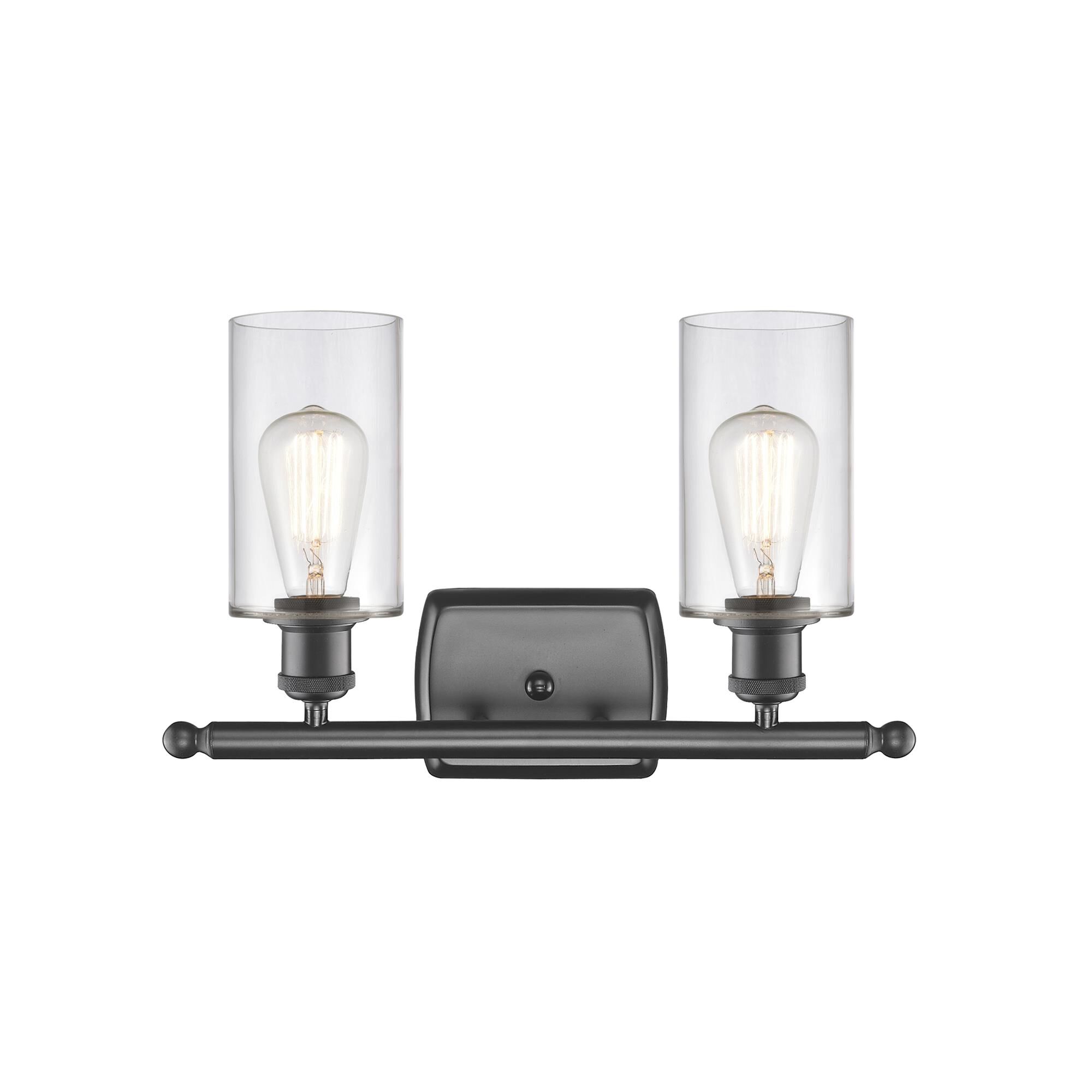Shown in Oil Rubbed Bronze finish and Drum glass and Glass shade and Polished Chrome accent