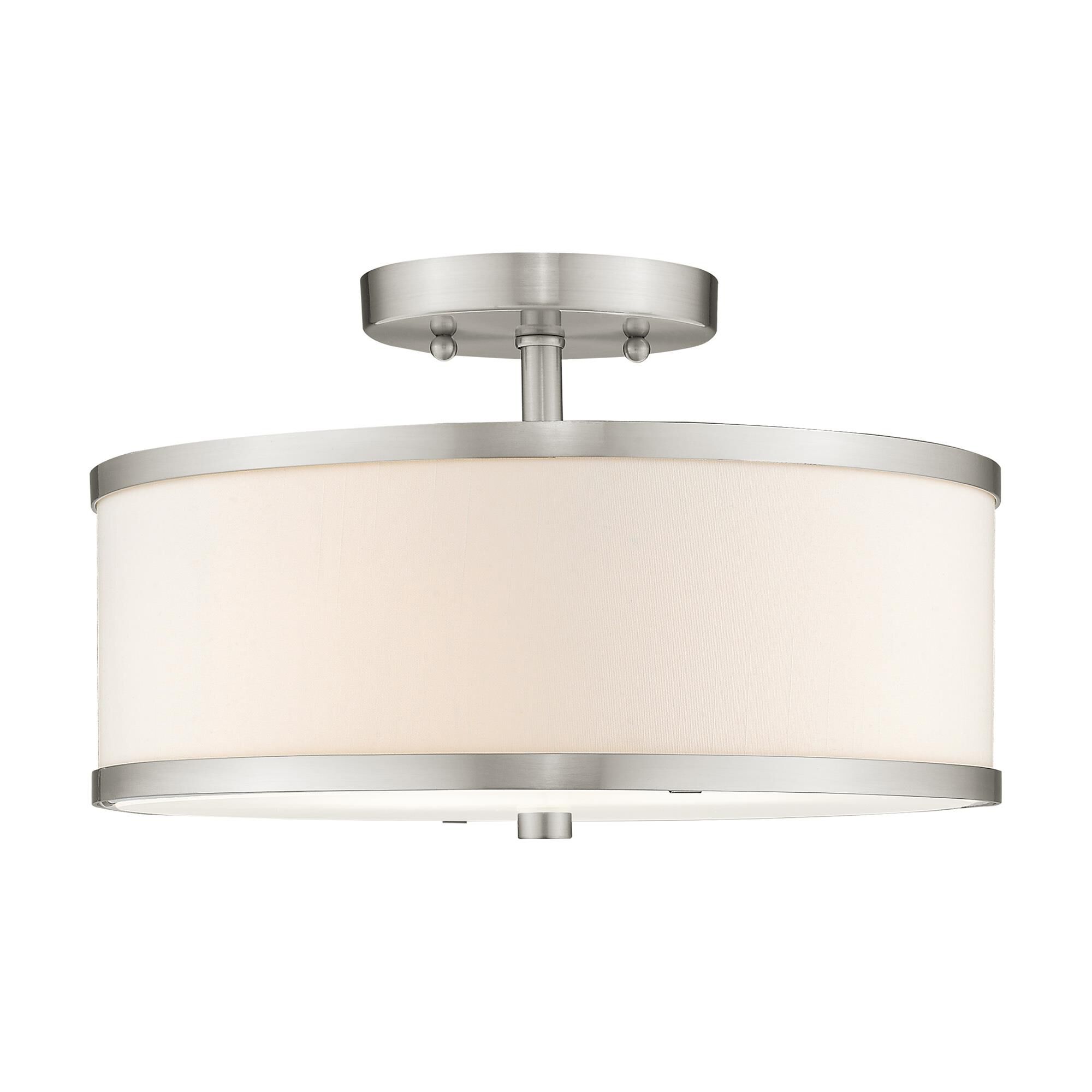 Shown in Brushed Nickel finish and Hand Crafted Off-White Fabric Hardback shade