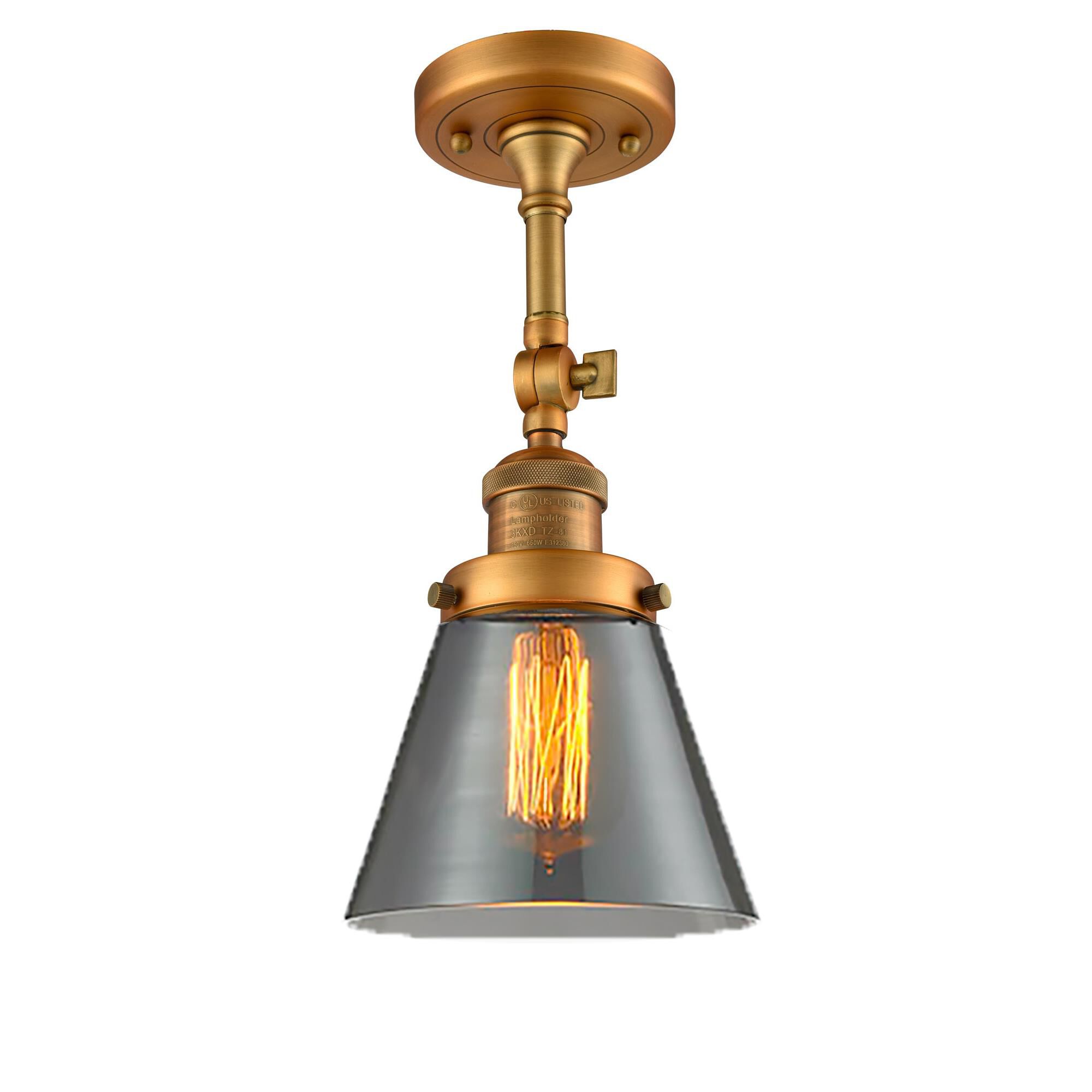 Shown in Brushed Brass finish and Smoked glass and None accent